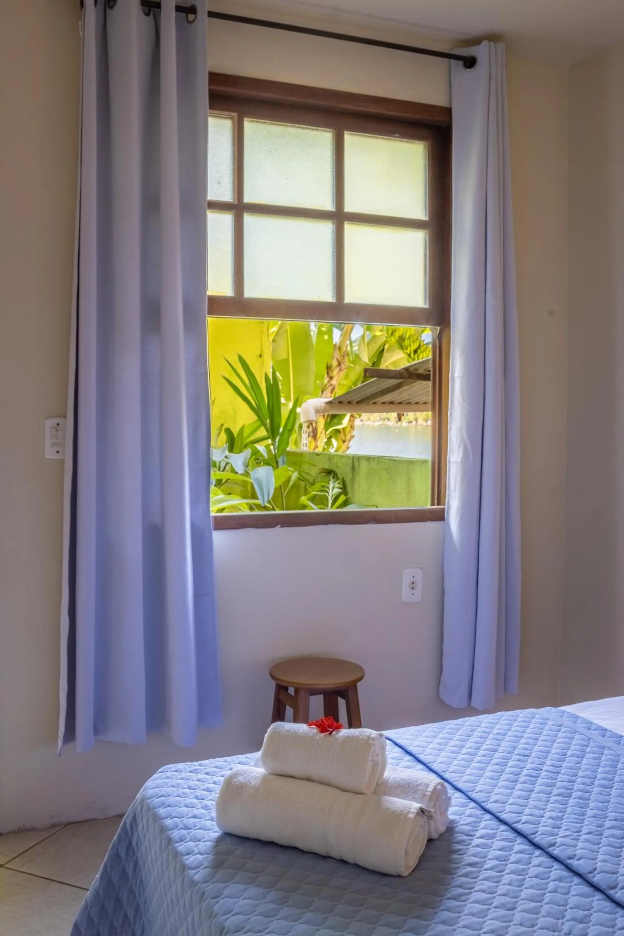 Bed in Pousada Cruzoé