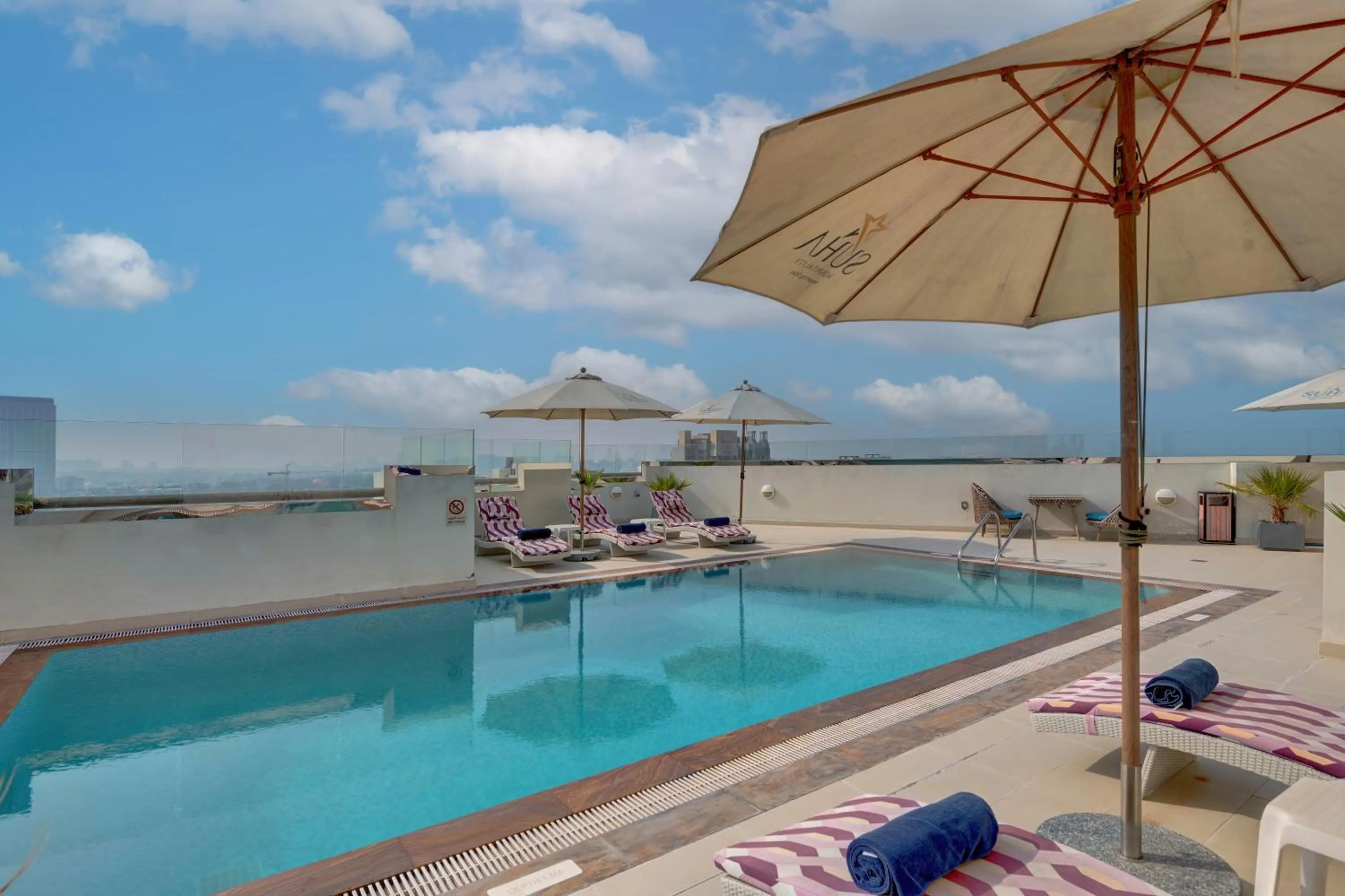 Swimming pool in SUHA Park Hotel Apartments, Waterfront Jaddaf