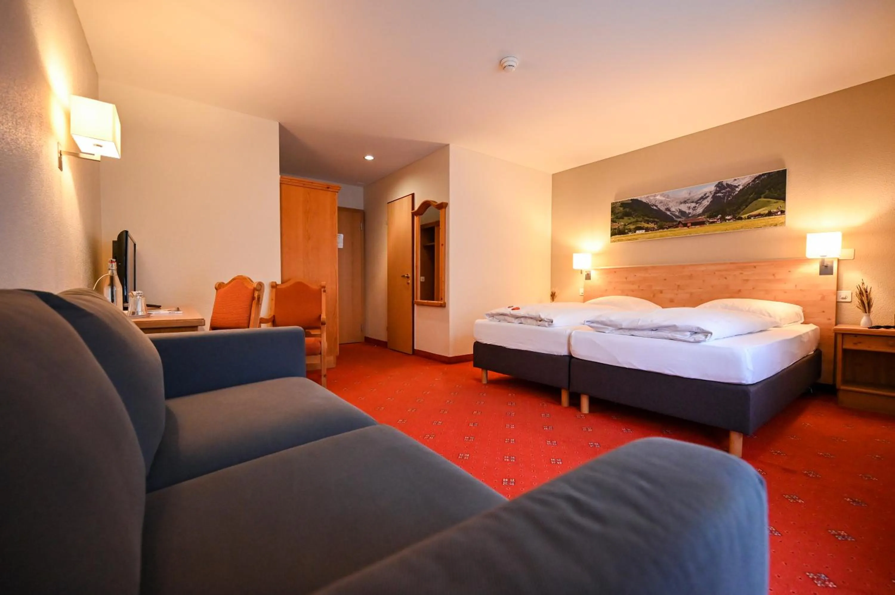 Photo of the whole room, Bed in Hotel Sonnwendhof Engelberg