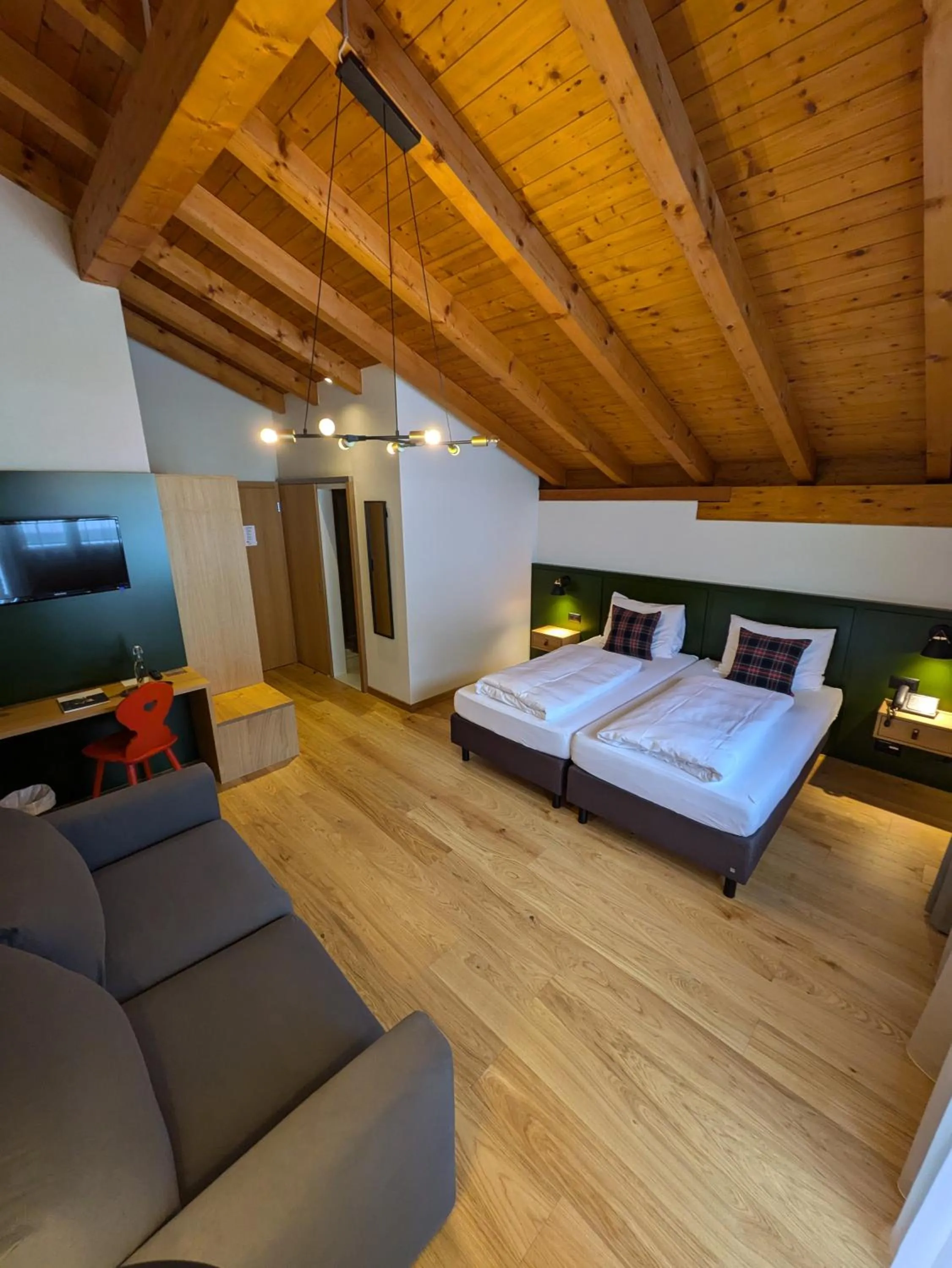 Photo of the whole room, Bed in Hotel Sonnwendhof Engelberg