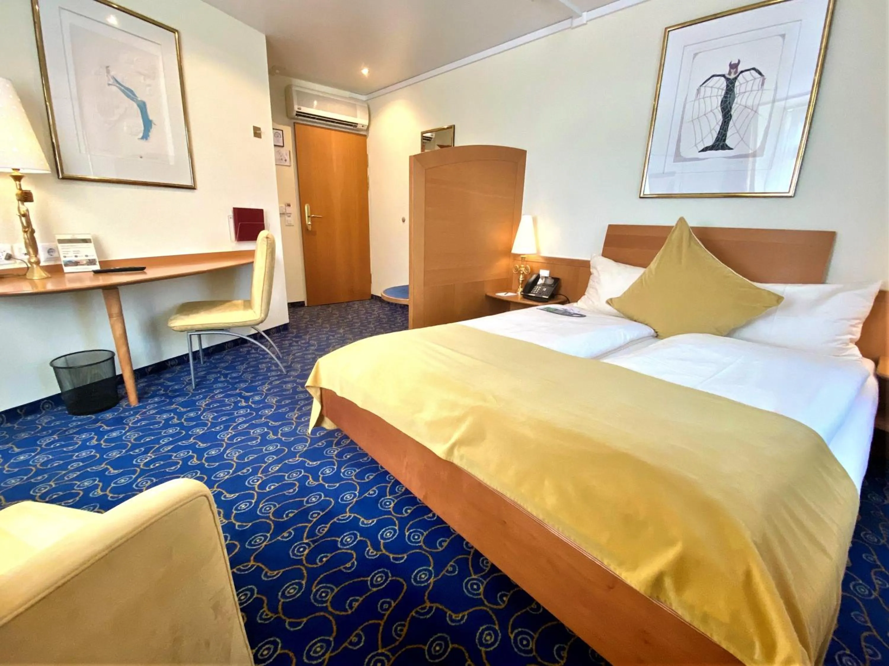 Photo of the whole room, Bed in GAIA Hotel Basel - the sustainable 4 star hotel