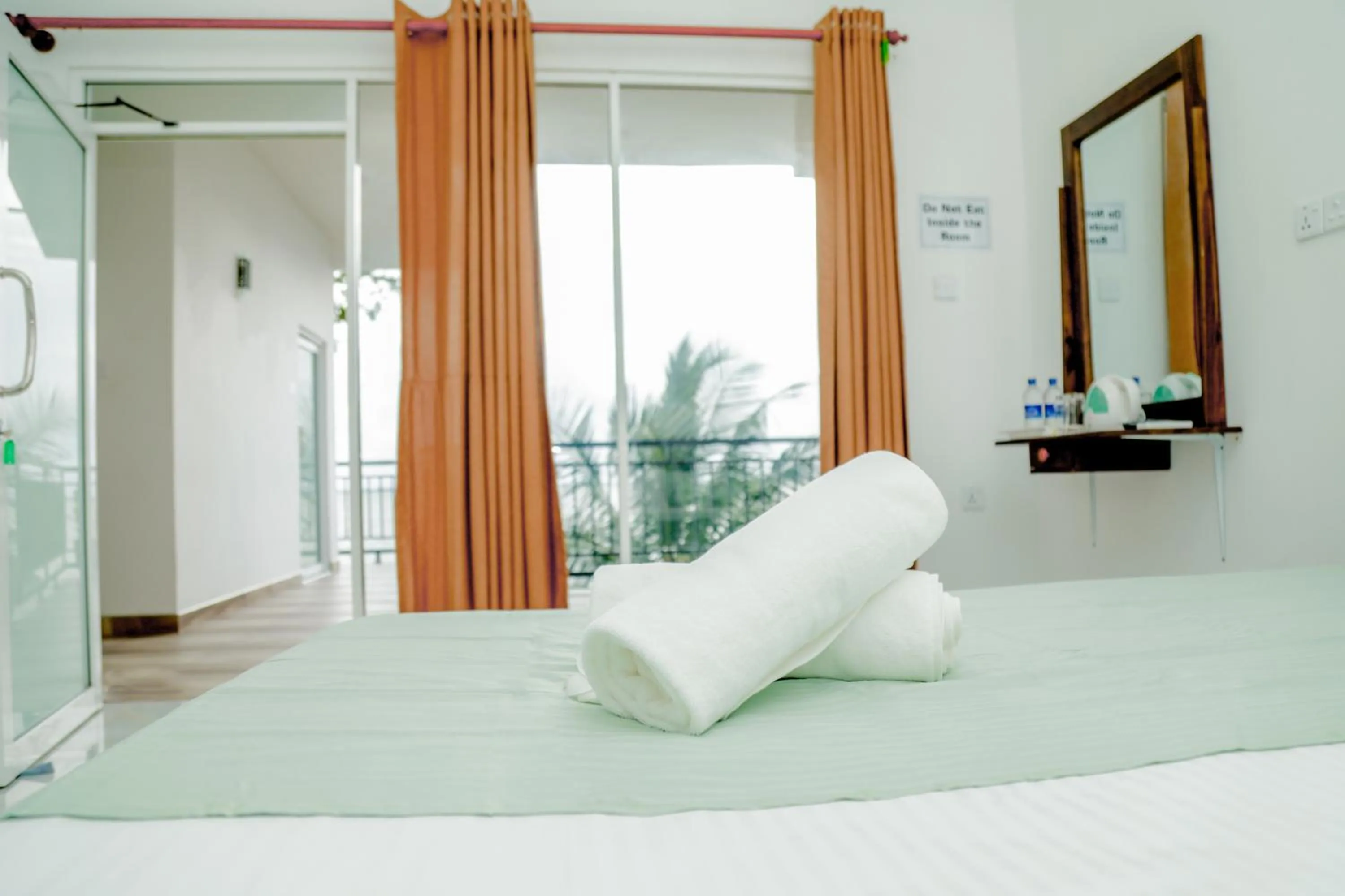 Bed in Araliya Lagoon Park Resort