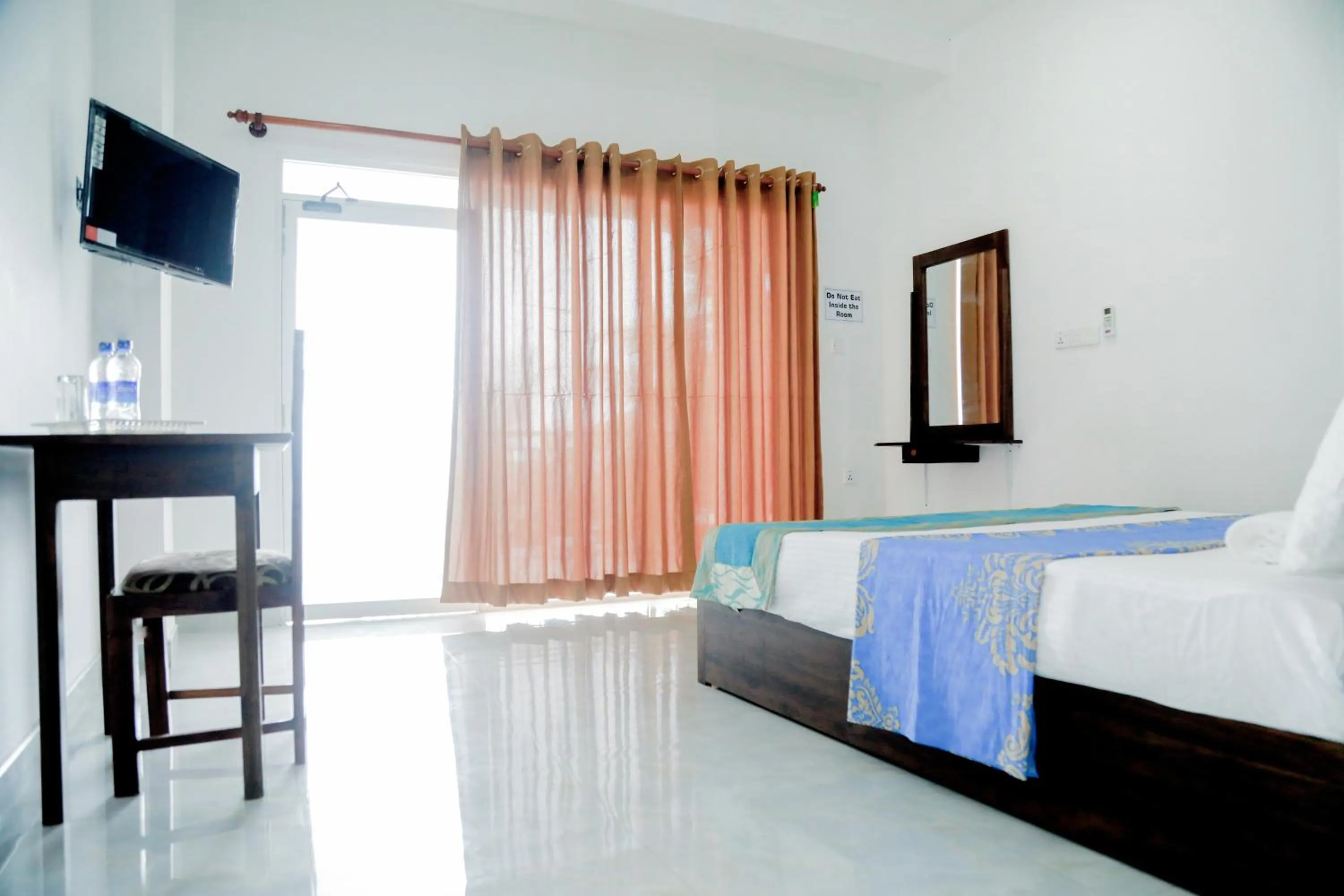 Bed in Araliya Lagoon Park Resort