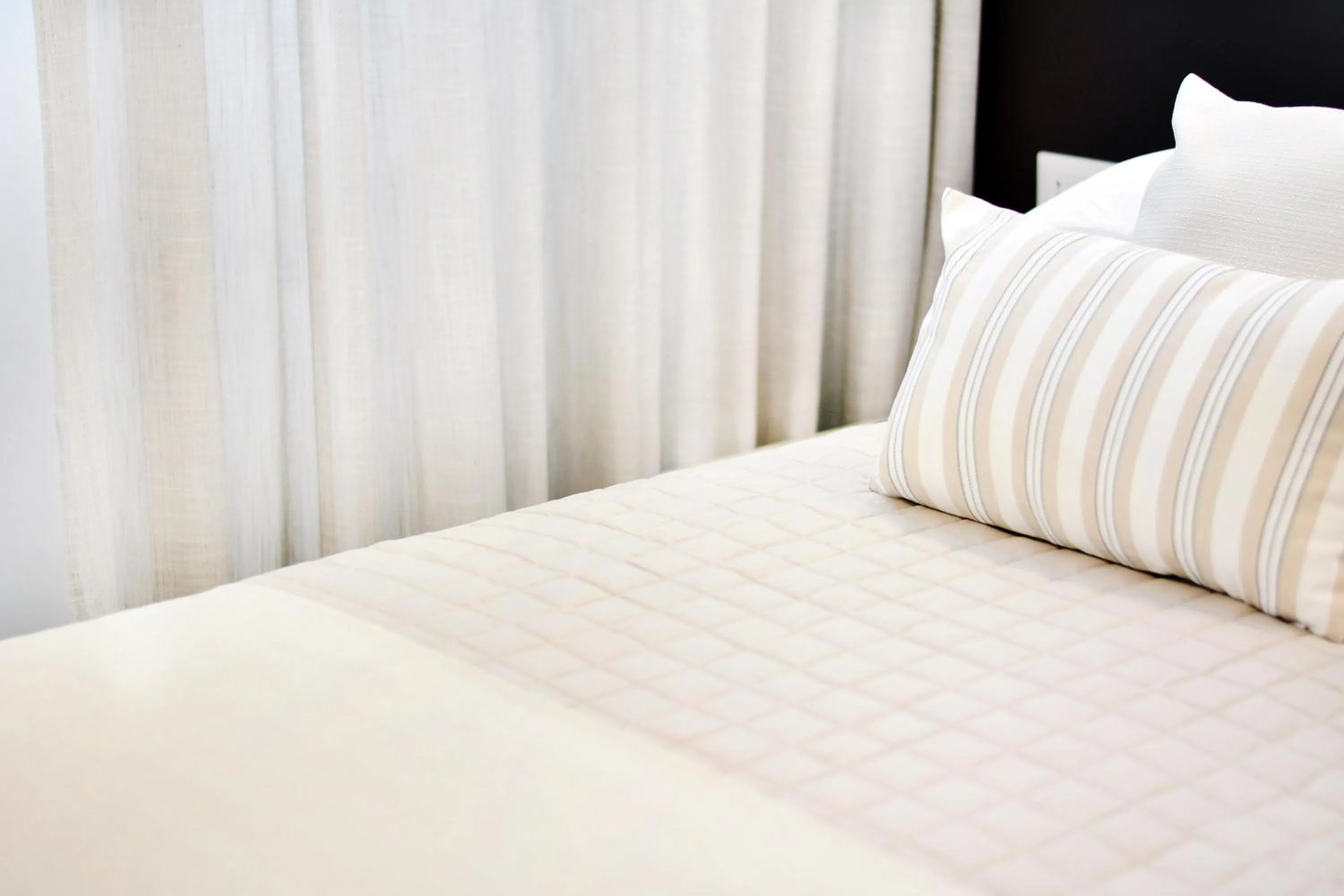 Decorative detail, Bed in Sunset Home Sorrento