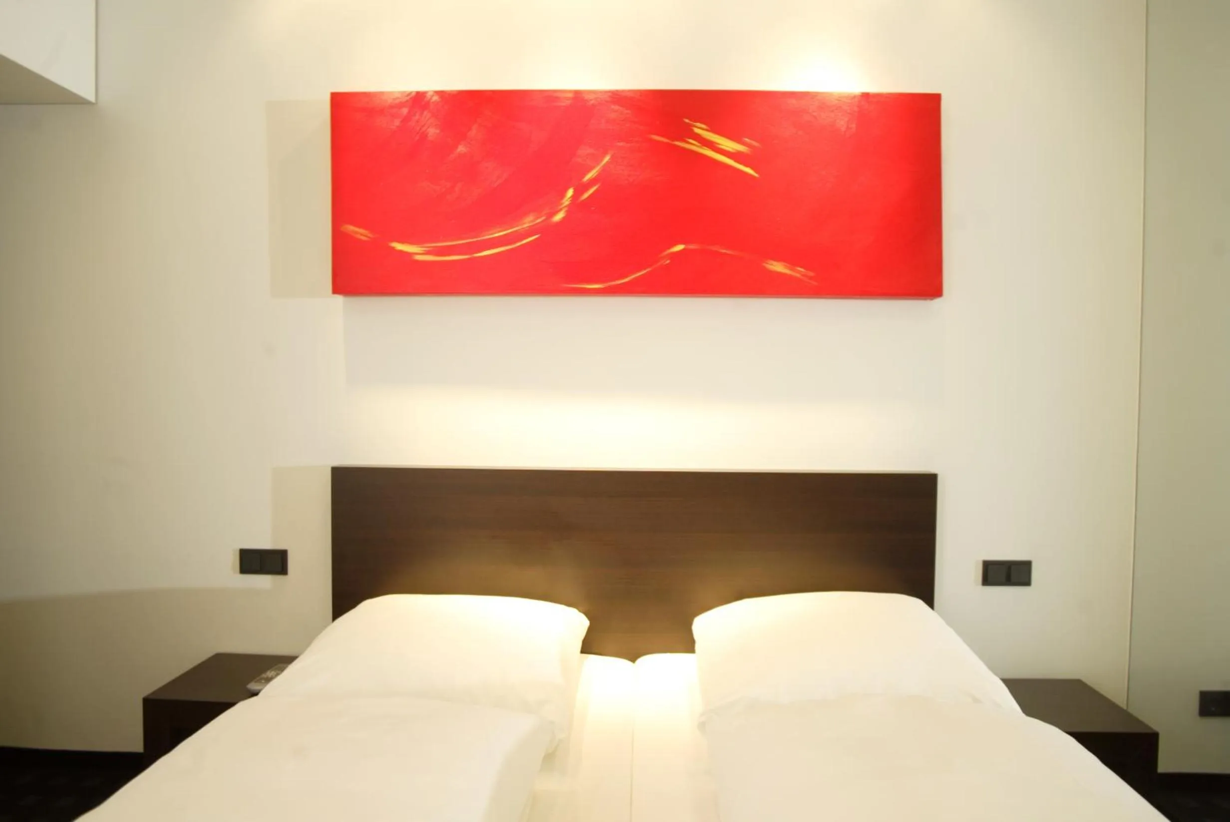 Bed in Ara Hotel Comfort