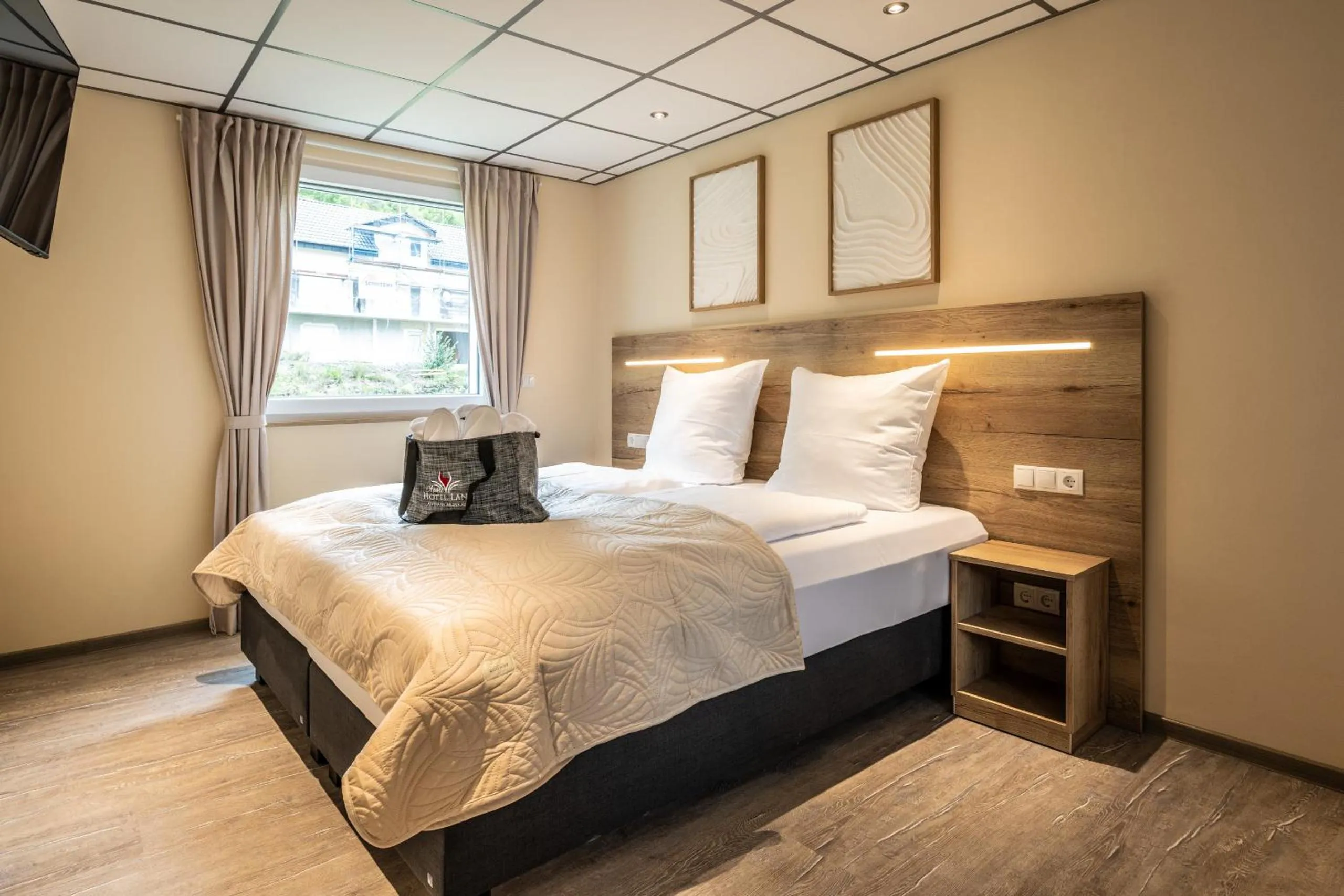 Bed in Apart Hotel Lang