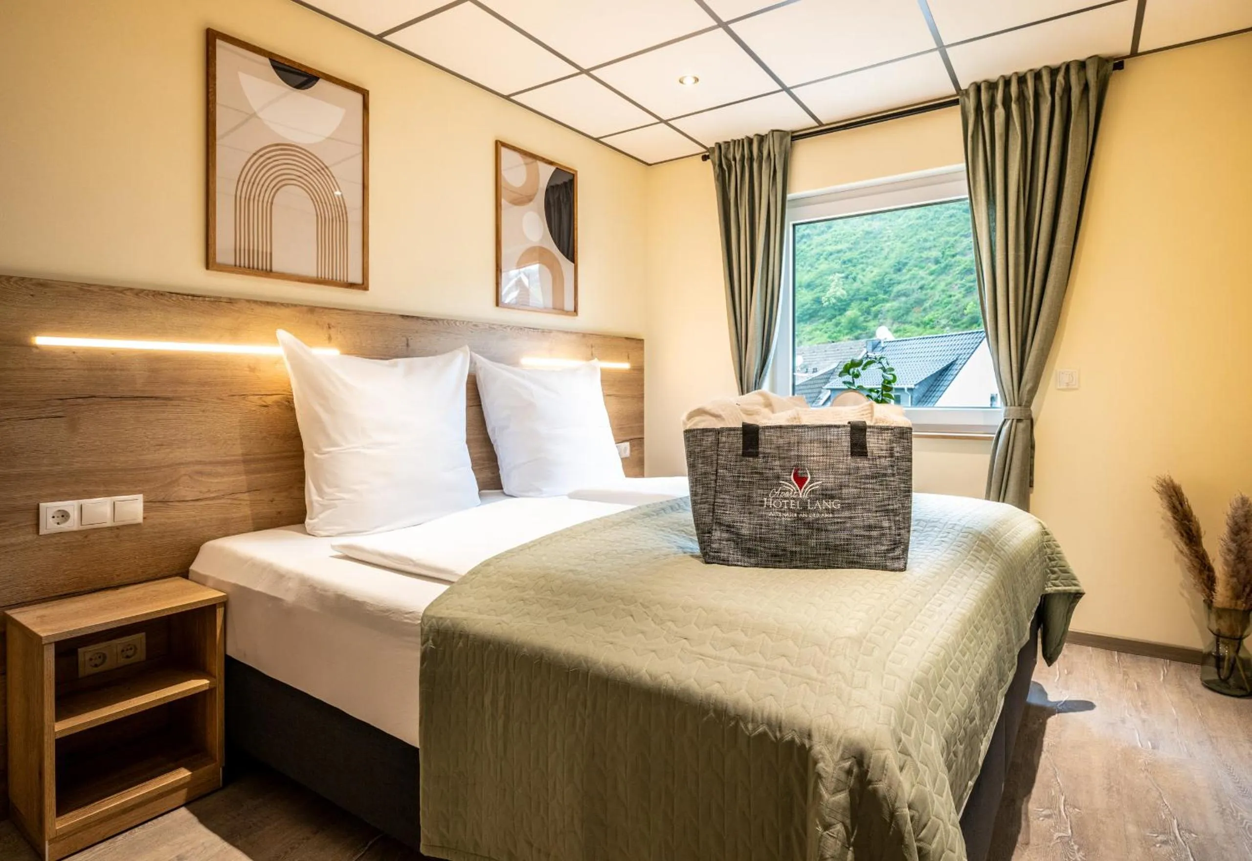 Bed in Apart Hotel Lang