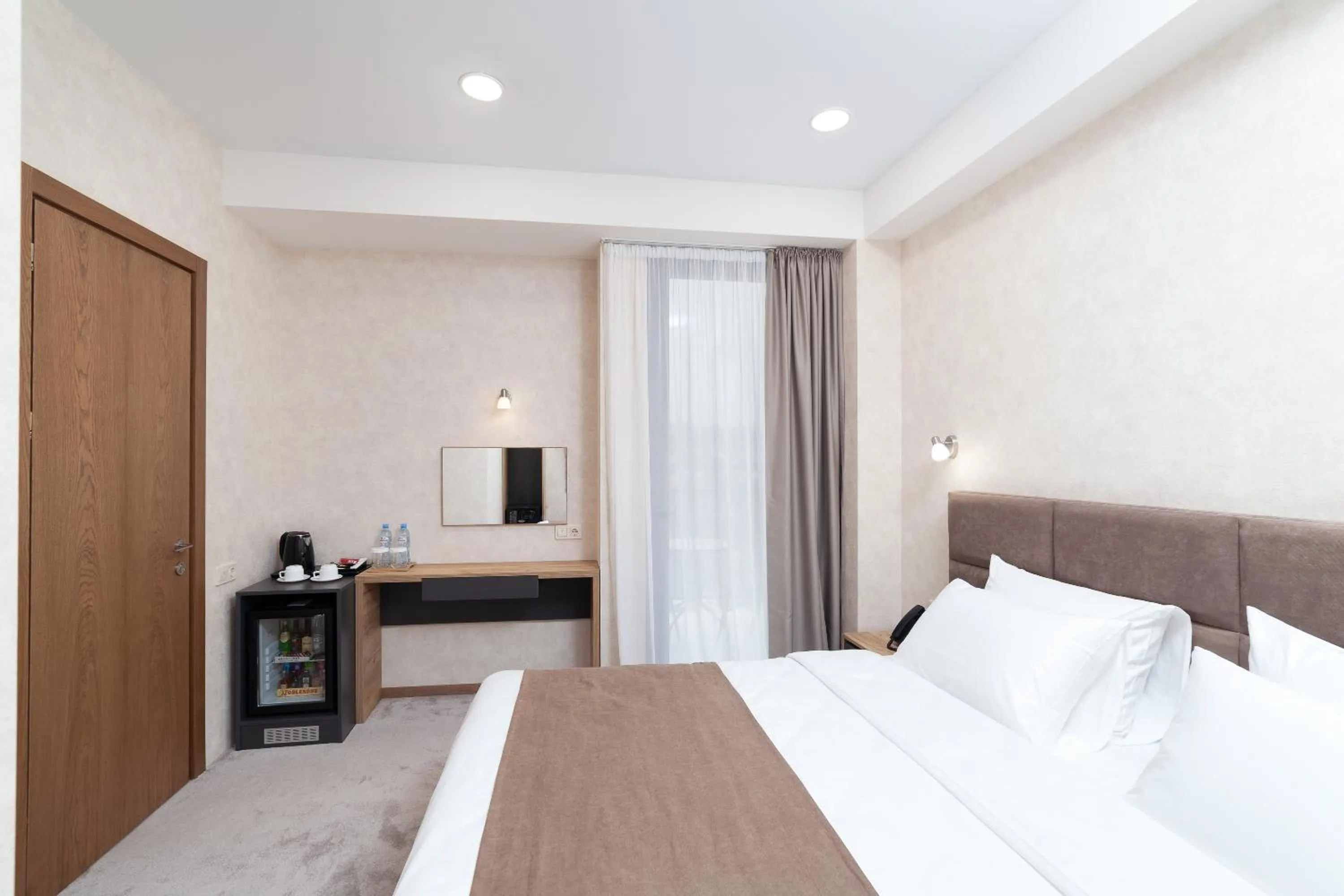 Bed in Brooch Boutique Hotel