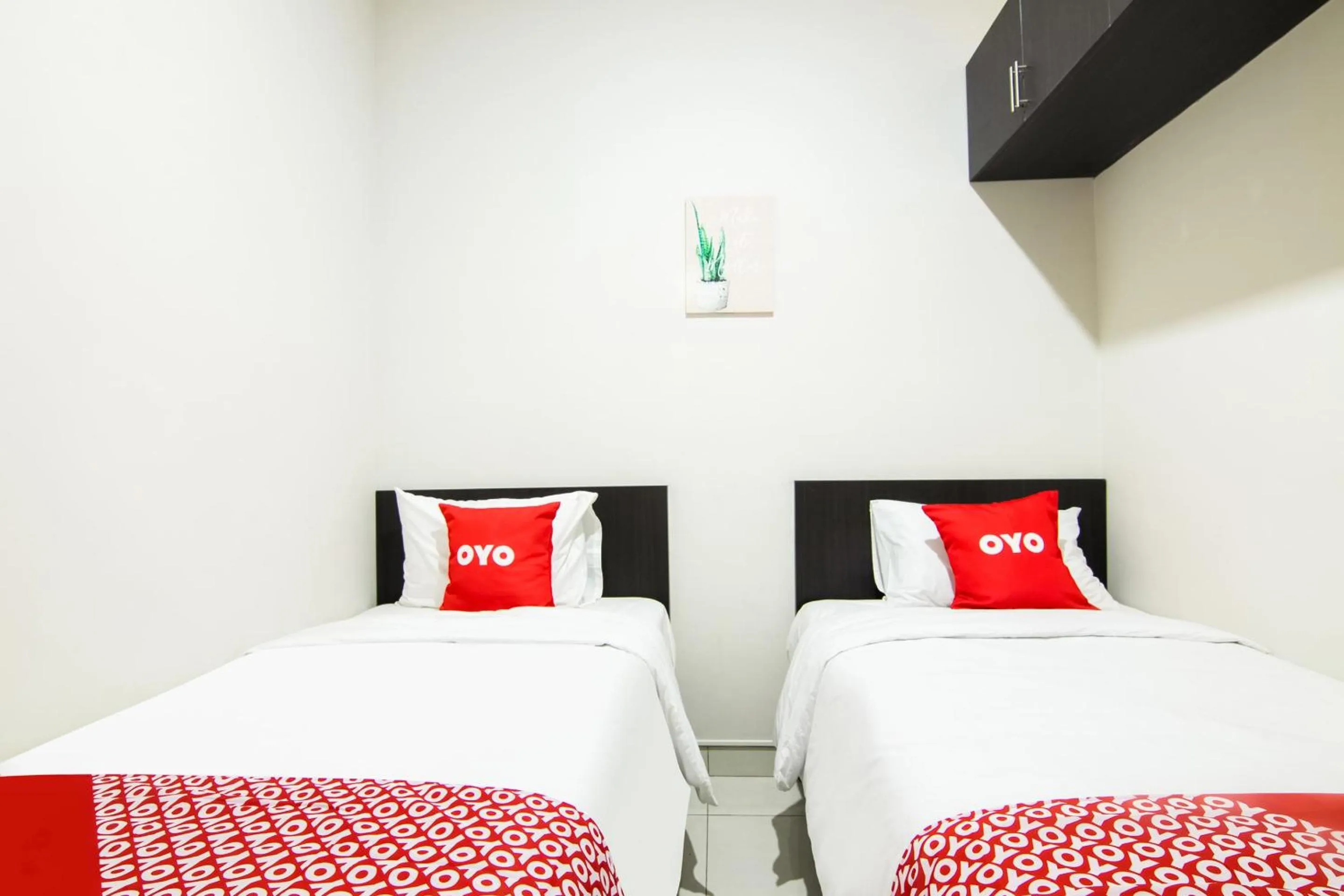 Bedroom, Bed in OYO 3826 Columbus Residence K11