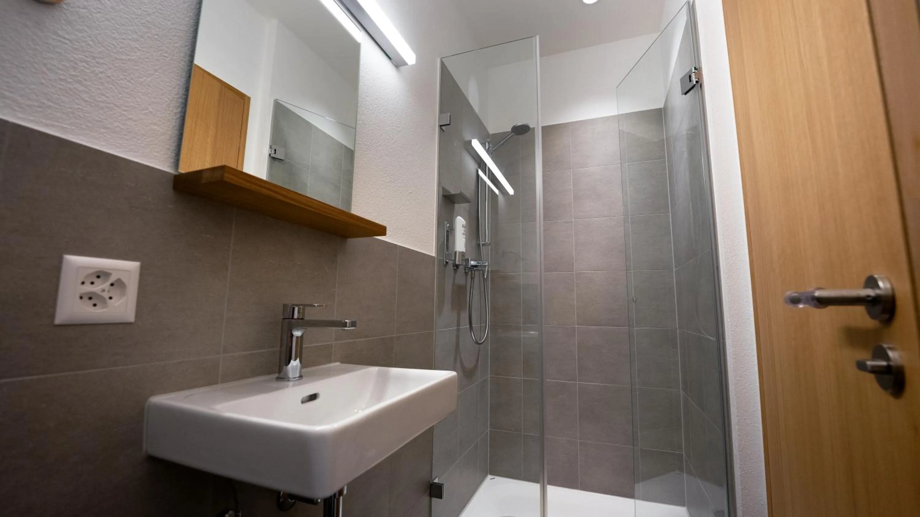 Bathroom in Laax wellnessHostel3000