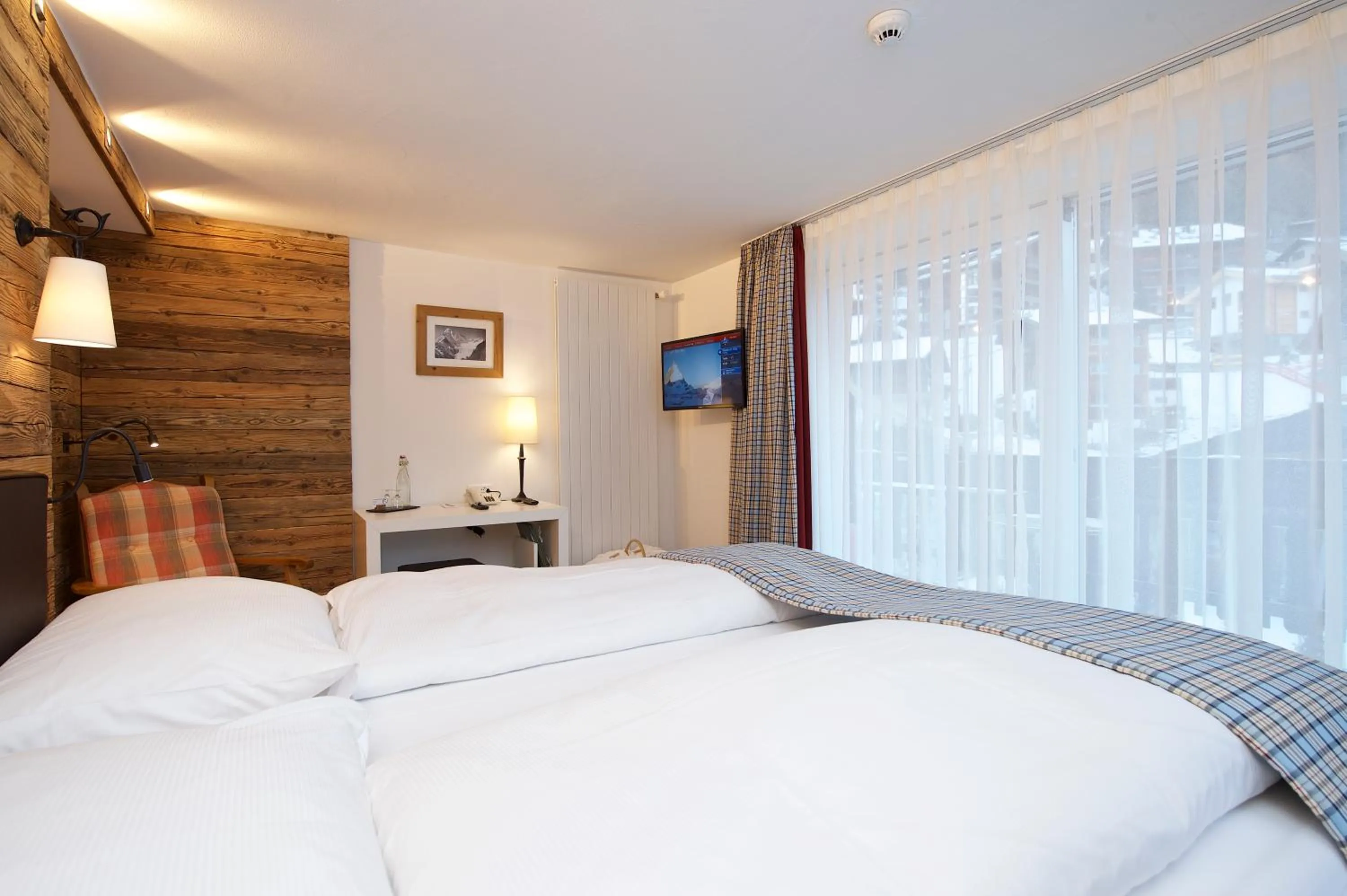 Bedroom, Bed in Hotel Bella Vista Zermatt