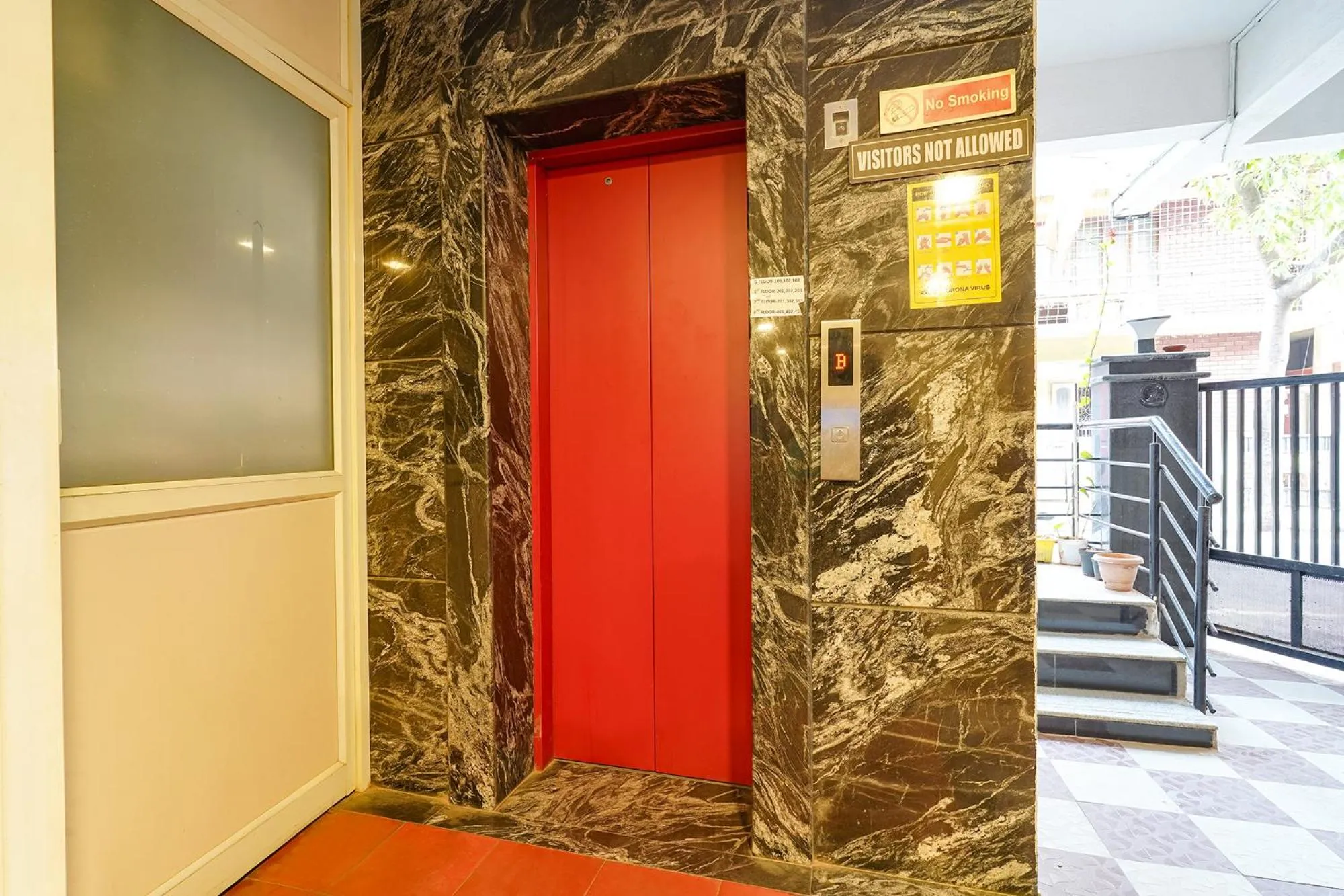 elevator in FabHotel Kings Suites Banaswadi