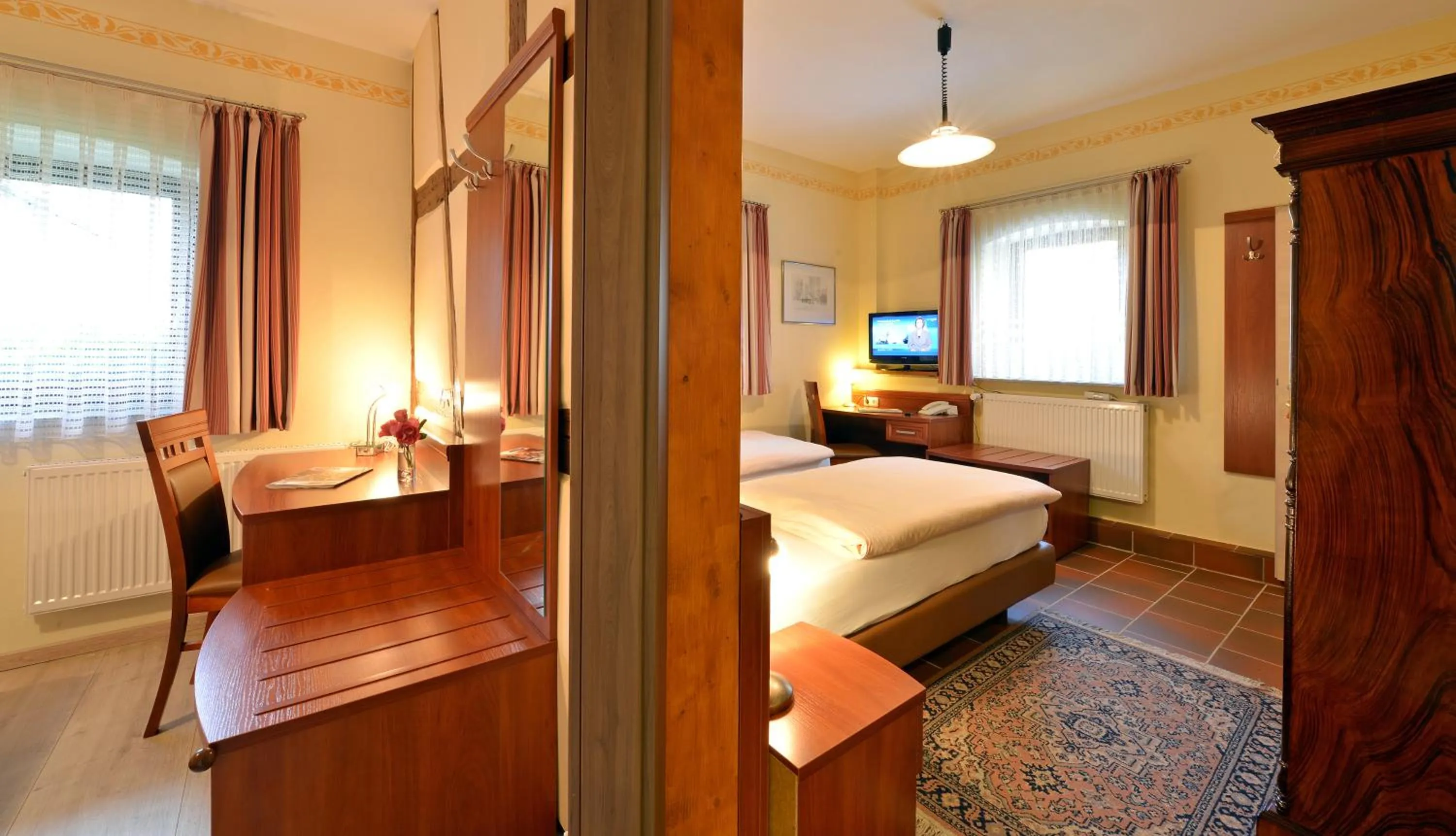 Photo of the whole room, Bed in Landhotel Schwarzes Ross