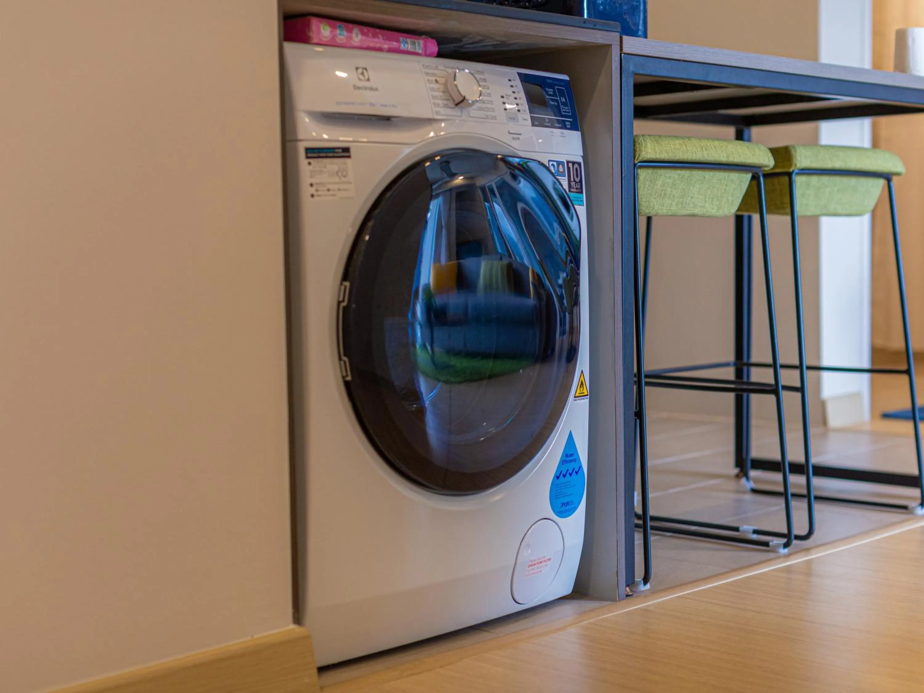 washing machine in Genting Premium Suite Windmill Upon Hills by JAz Home Suites