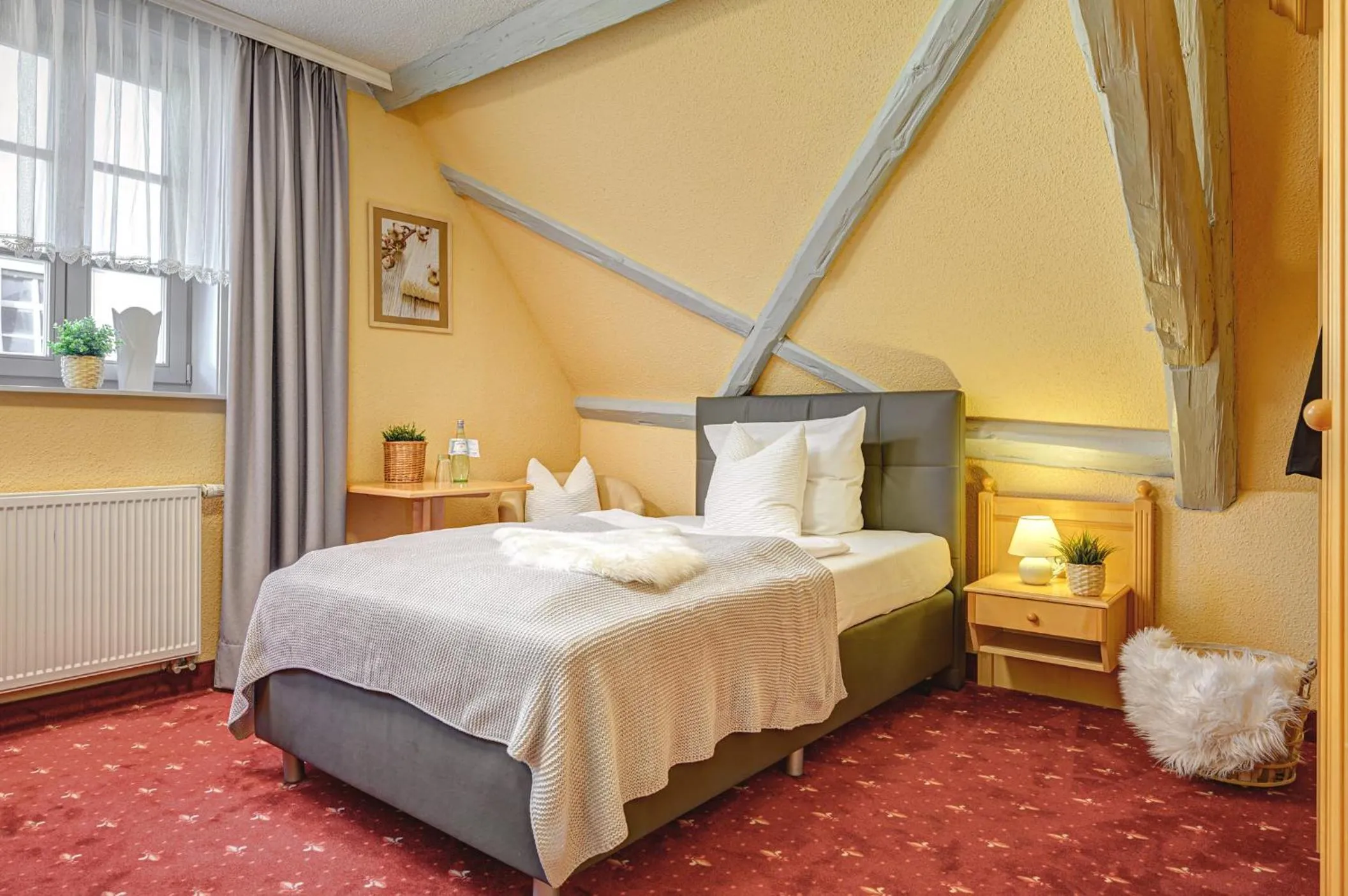 Bed in Hotel Mühlhäuser Hof