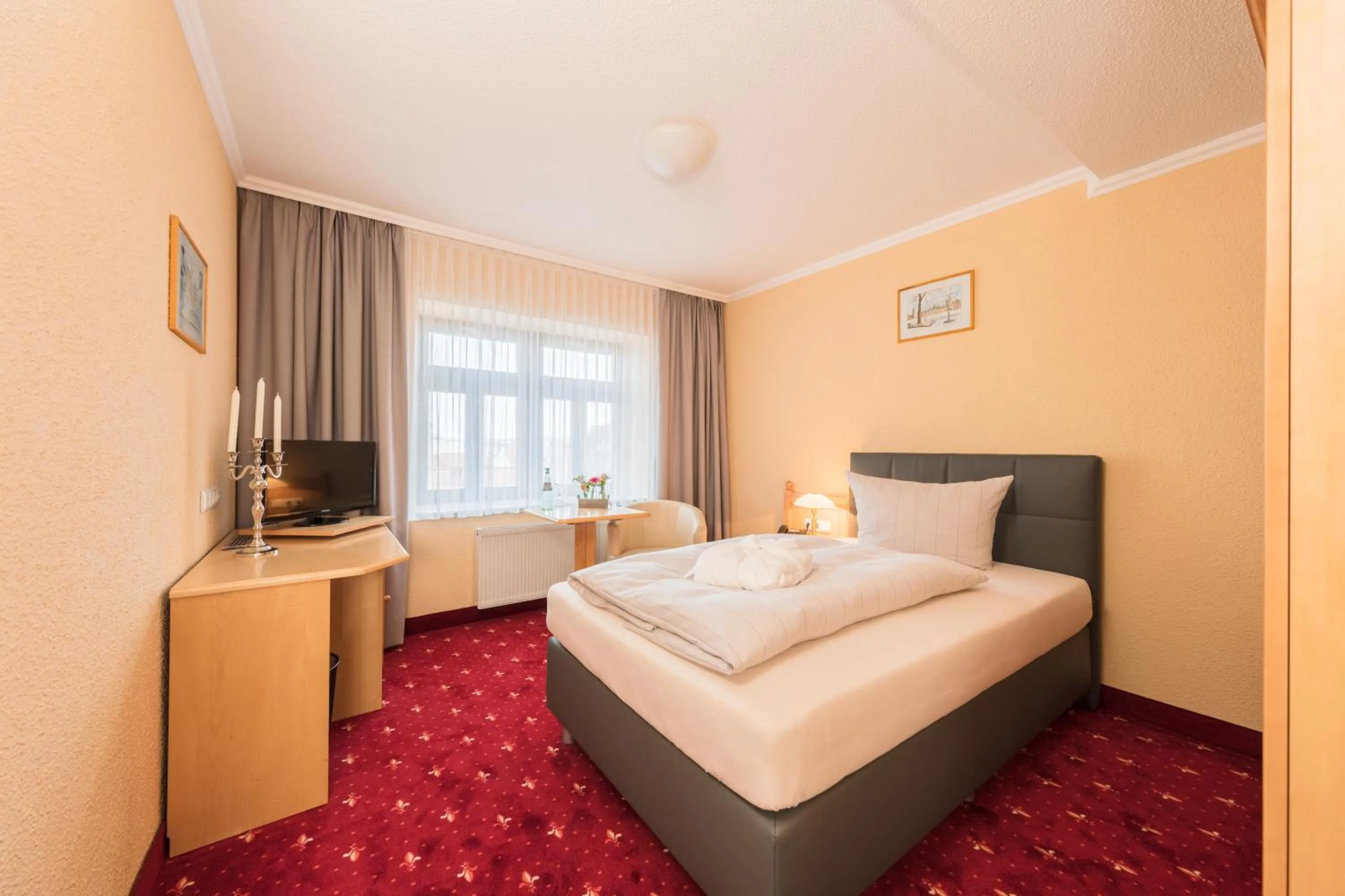 Bed in Hotel Mühlhäuser Hof