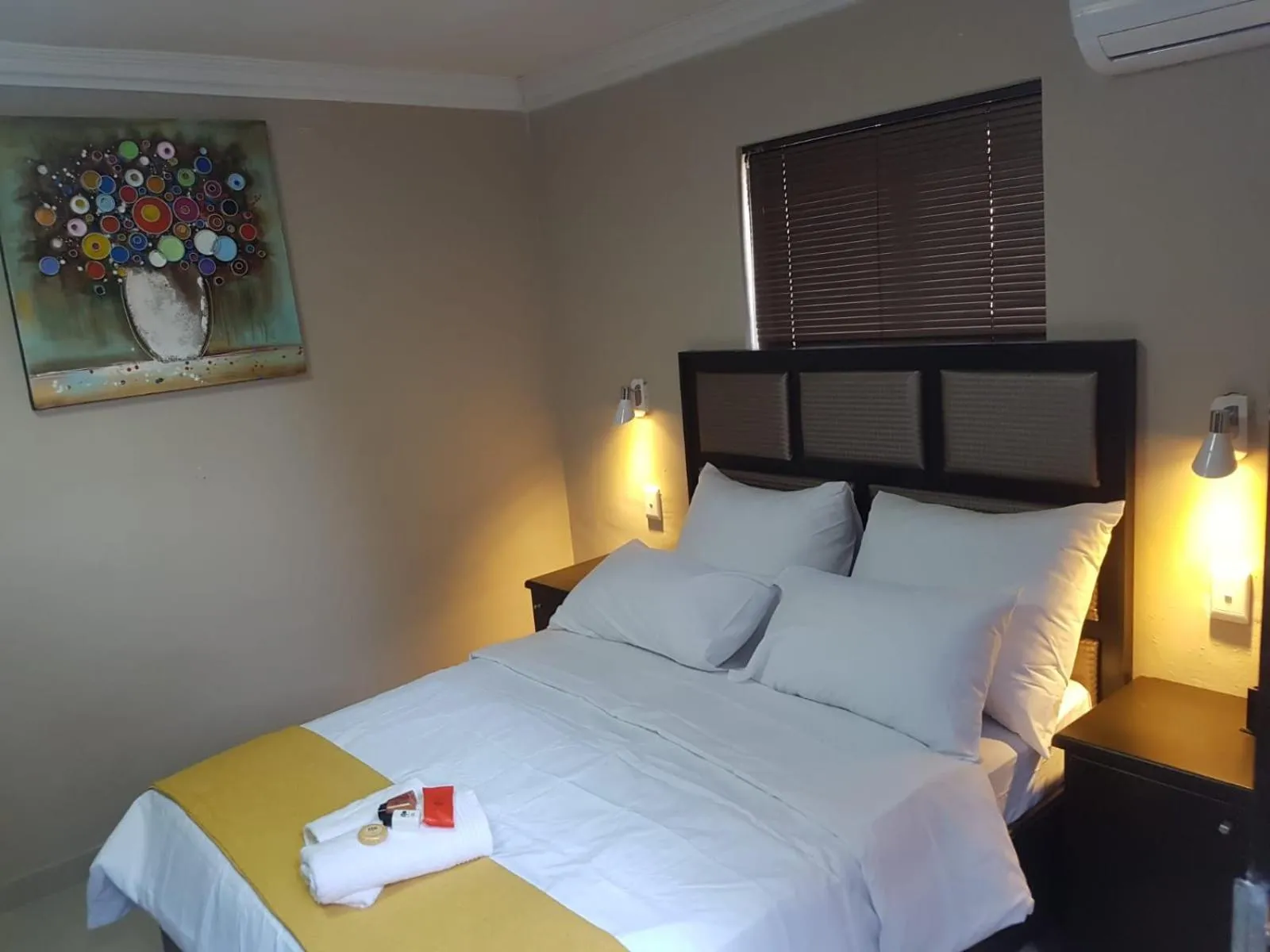 Bed in The Royal Prime Guest Lodge