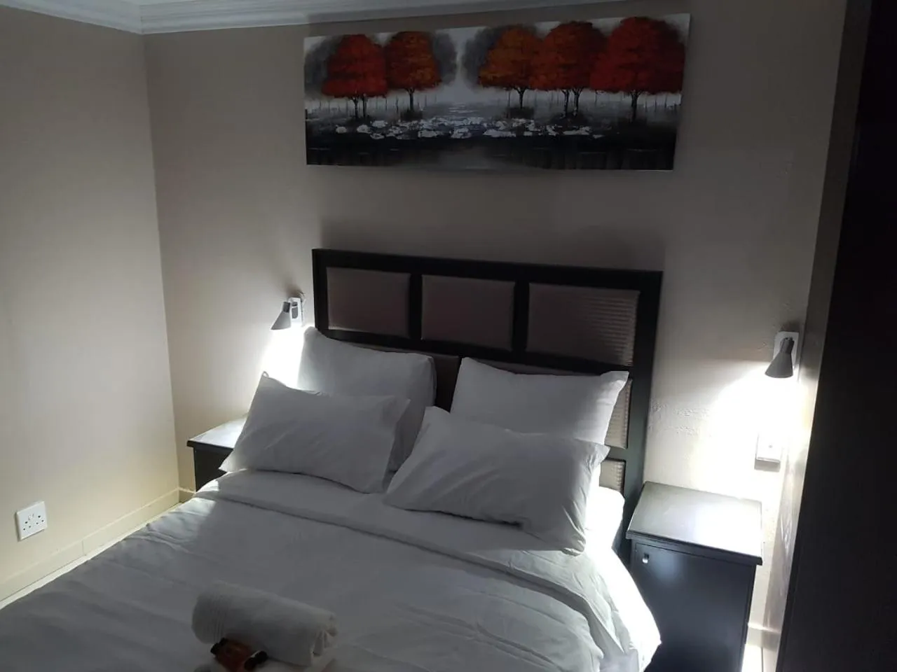 Bed in The Royal Prime Guest Lodge