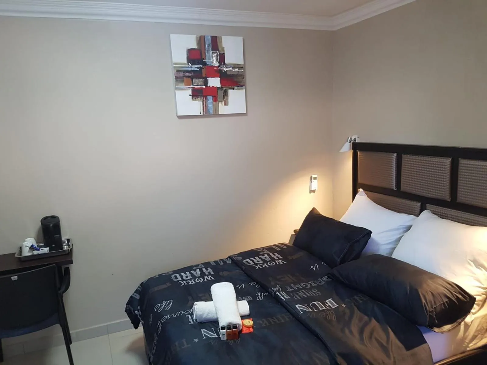 Bed in The Royal Prime Guest Lodge