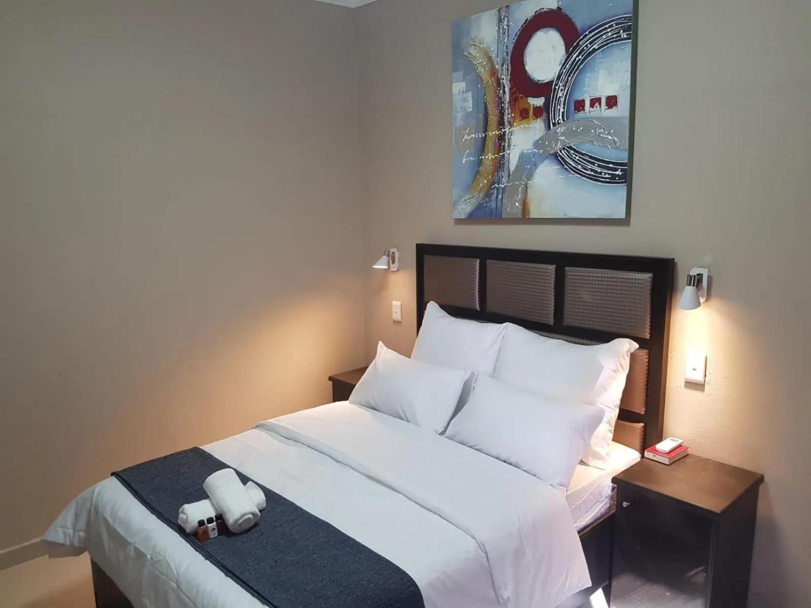 Bed in The Royal Prime Guest Lodge