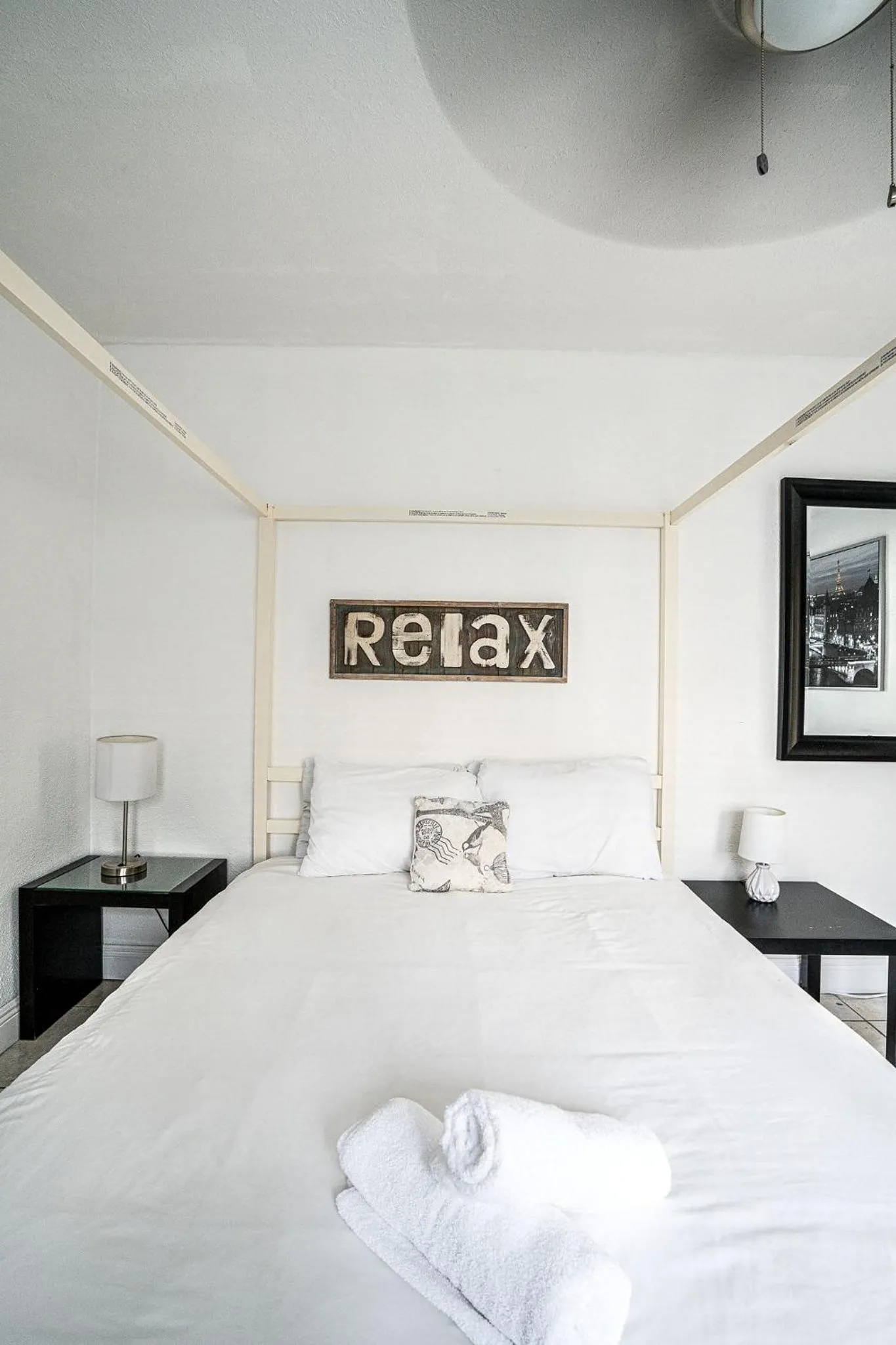 Bed in Little Paris by the ocean self check in