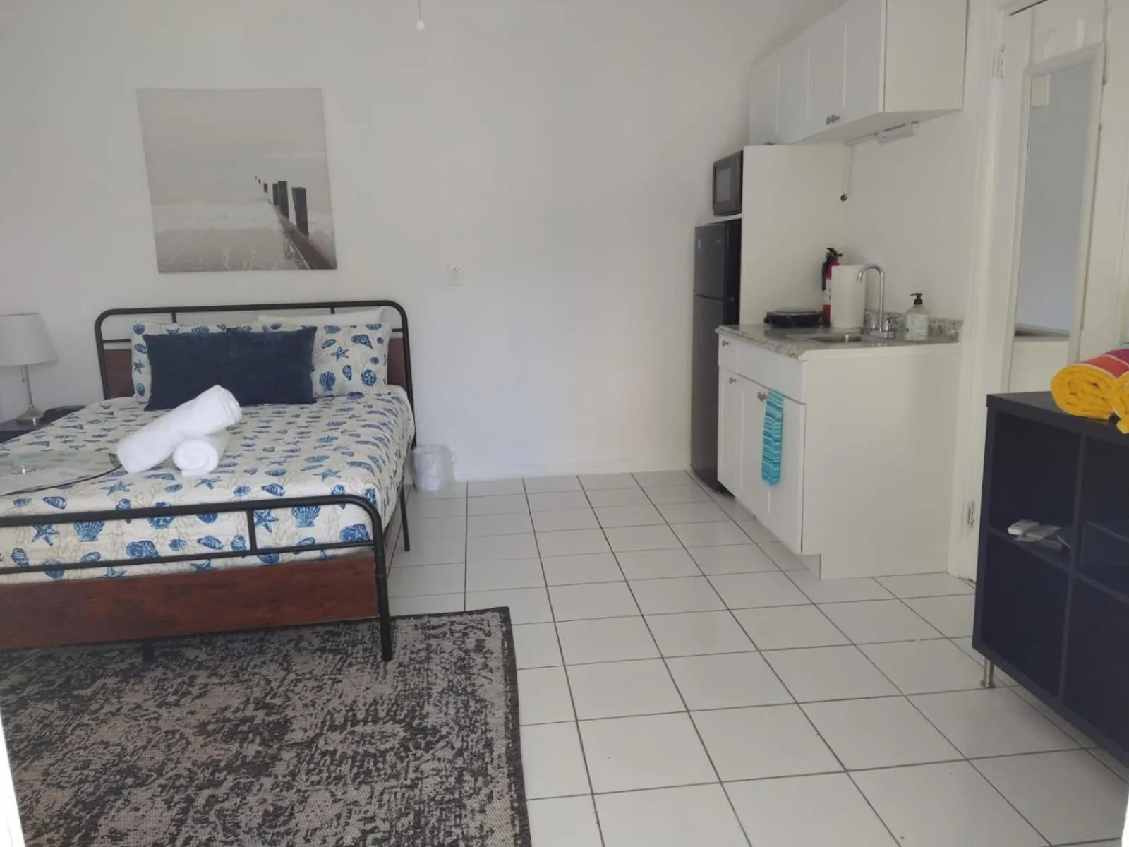 Photo of the whole room, Bed in Little Paris by the ocean self check in