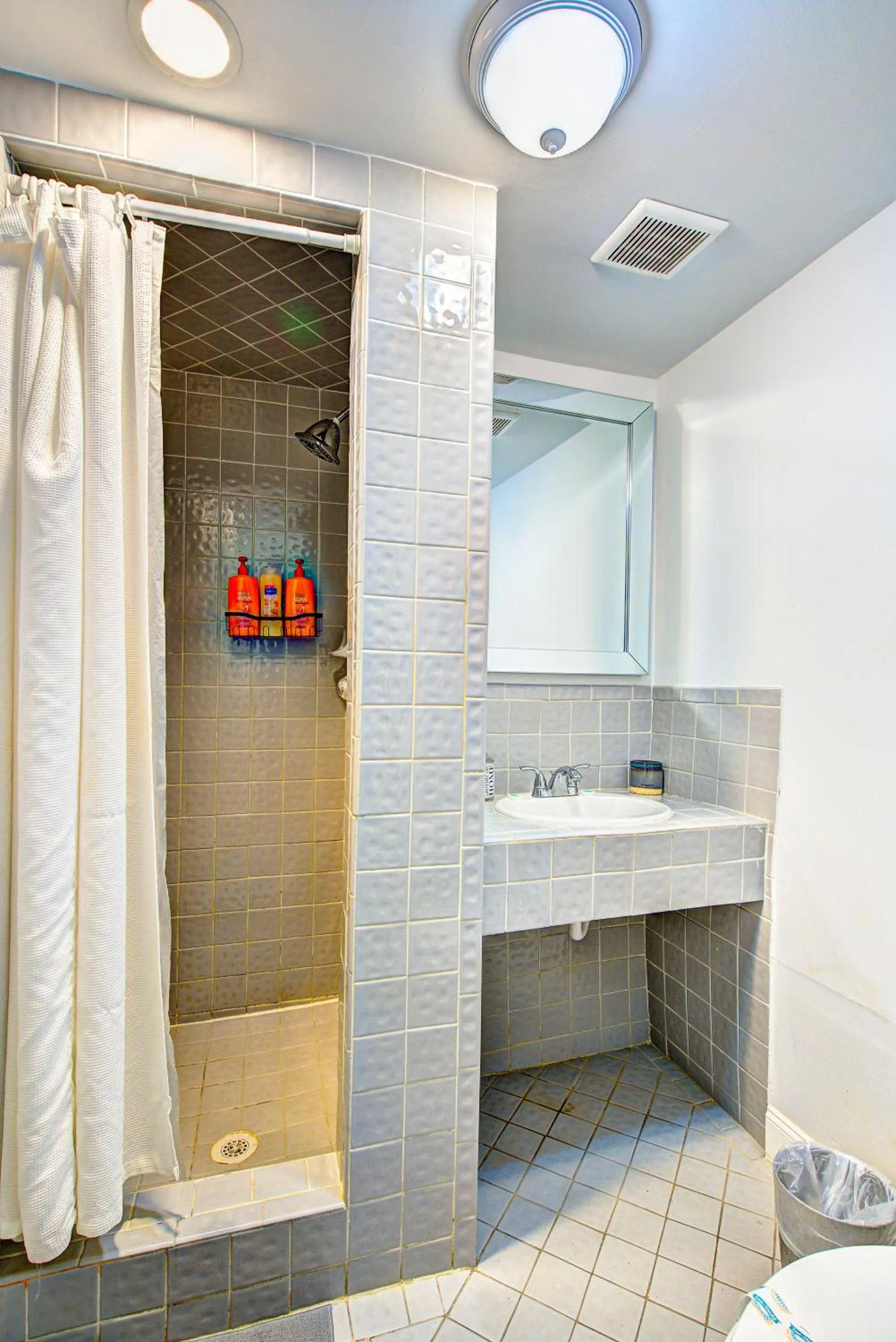 Bathroom in Little Paris by the ocean self check in