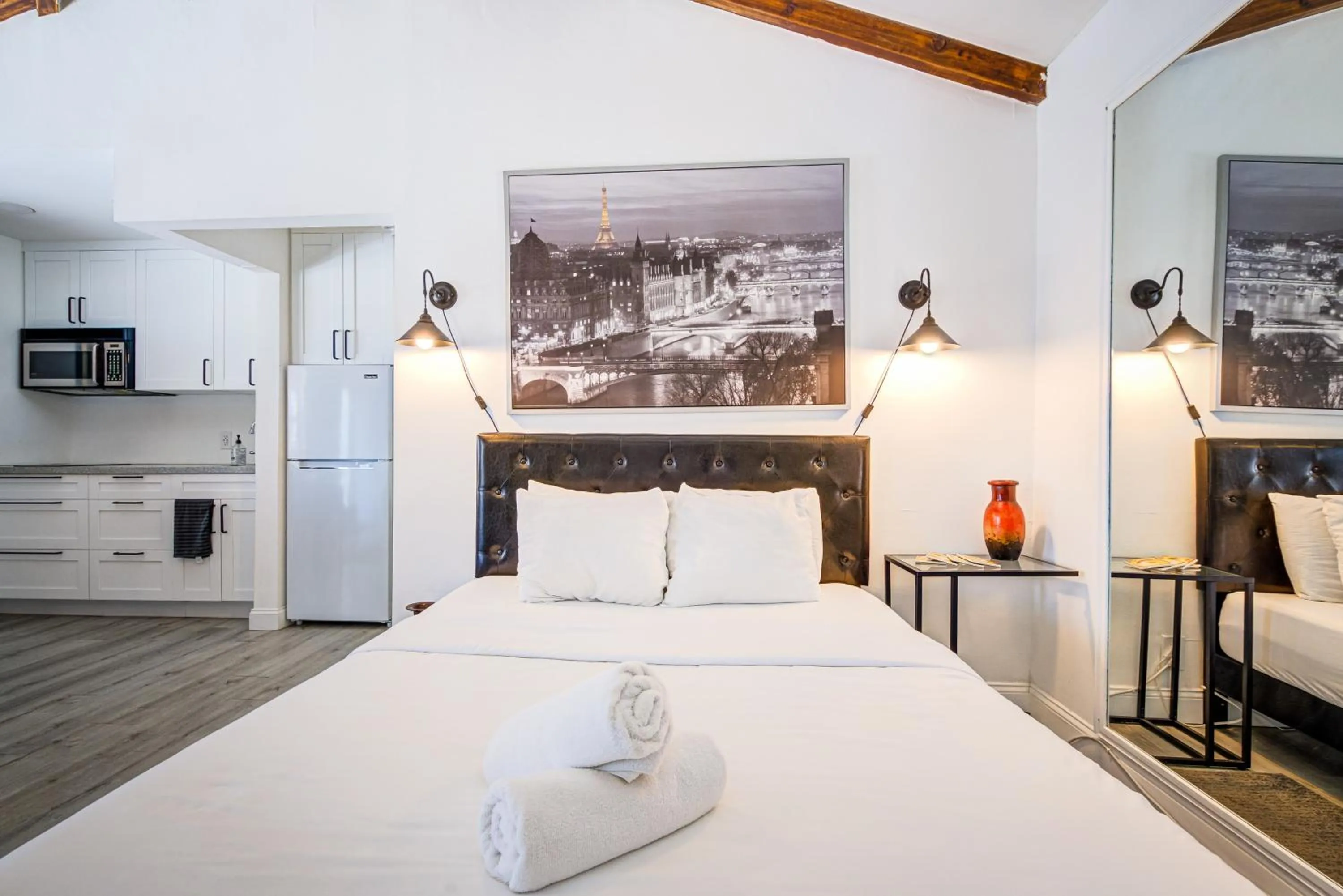 Bed in Little Paris by the ocean self check in