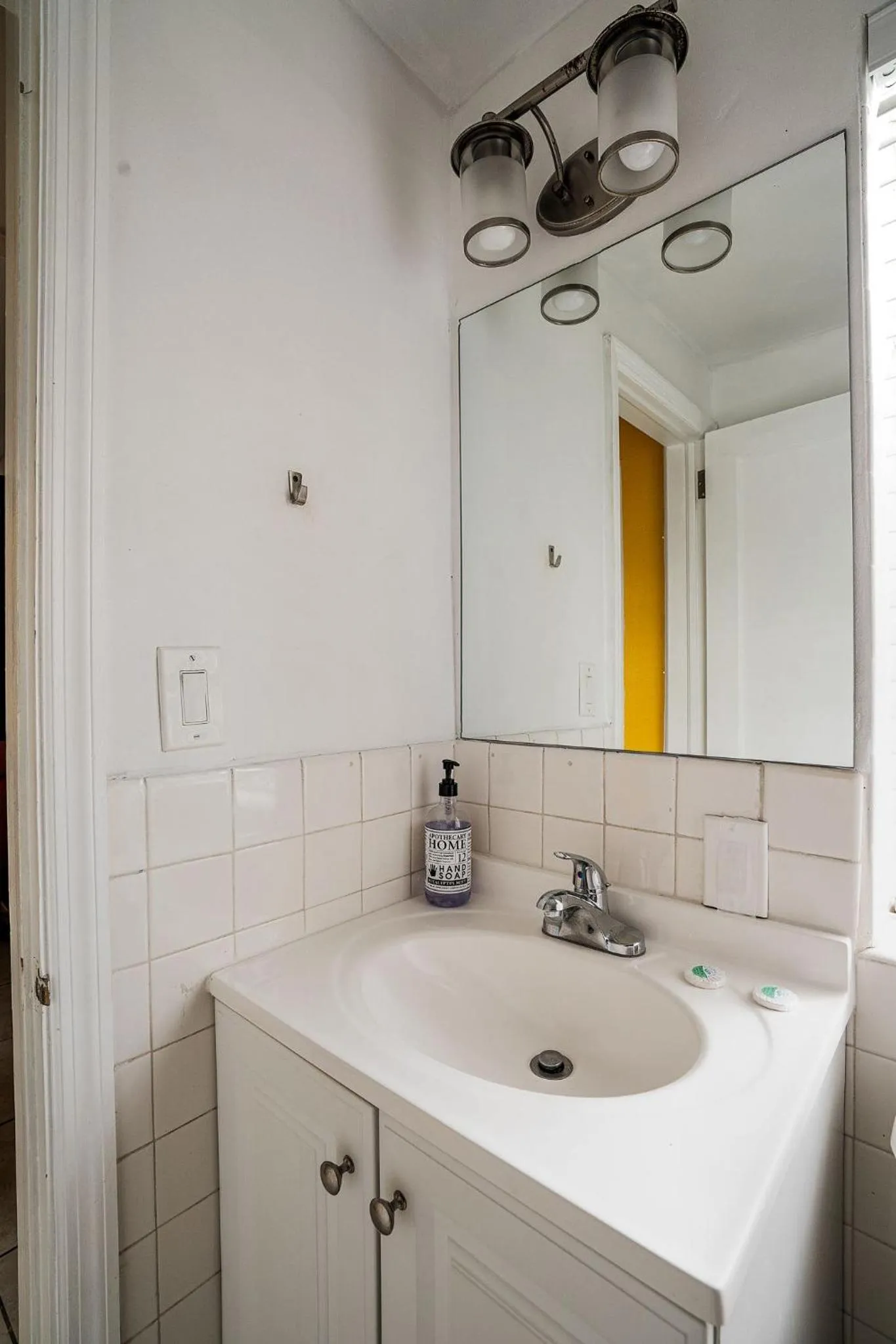 Bathroom in Little Paris by the ocean self check in