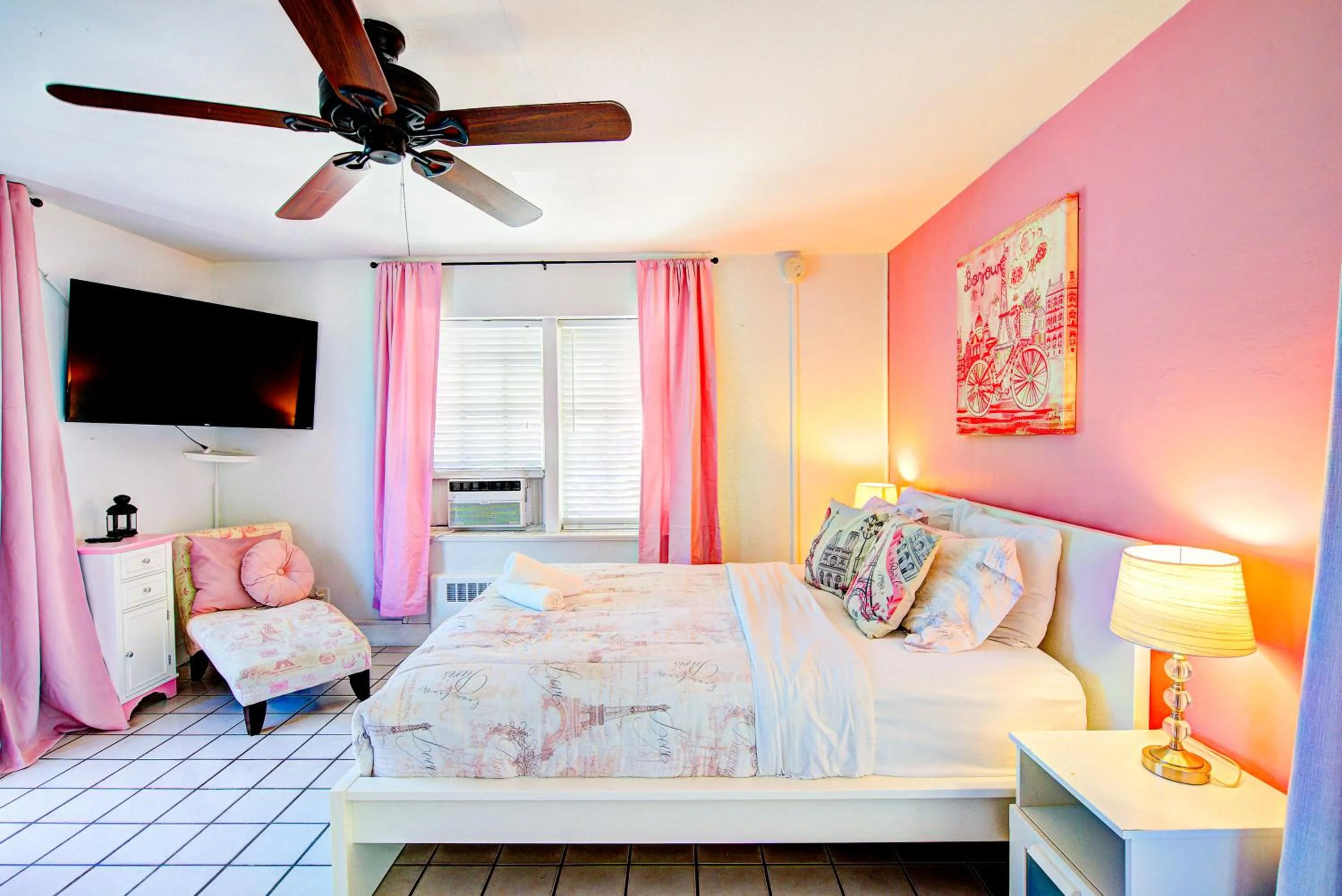 Bed in Little Paris by the ocean self check in