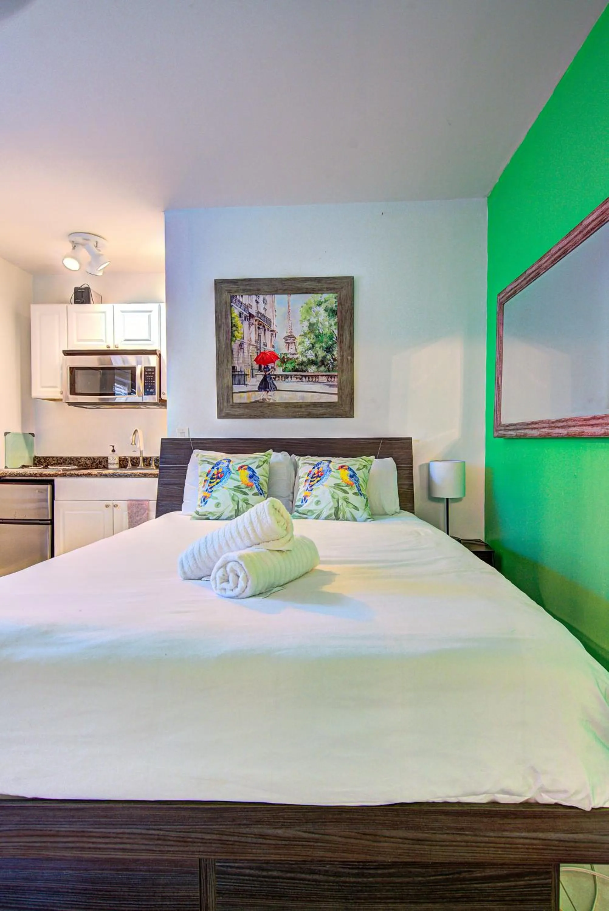 Bed in Little Paris by the ocean self check in