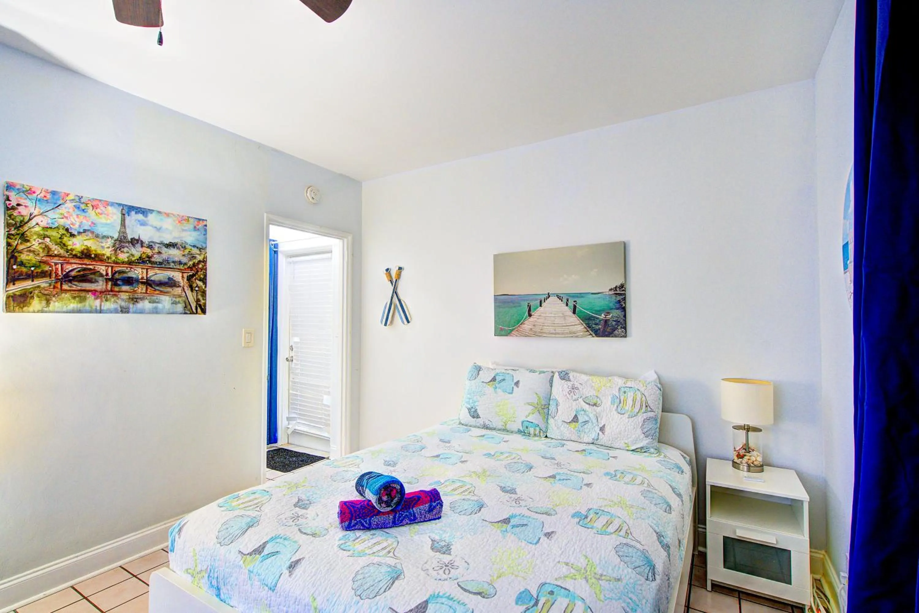 Bed in Little Paris by the ocean self check in