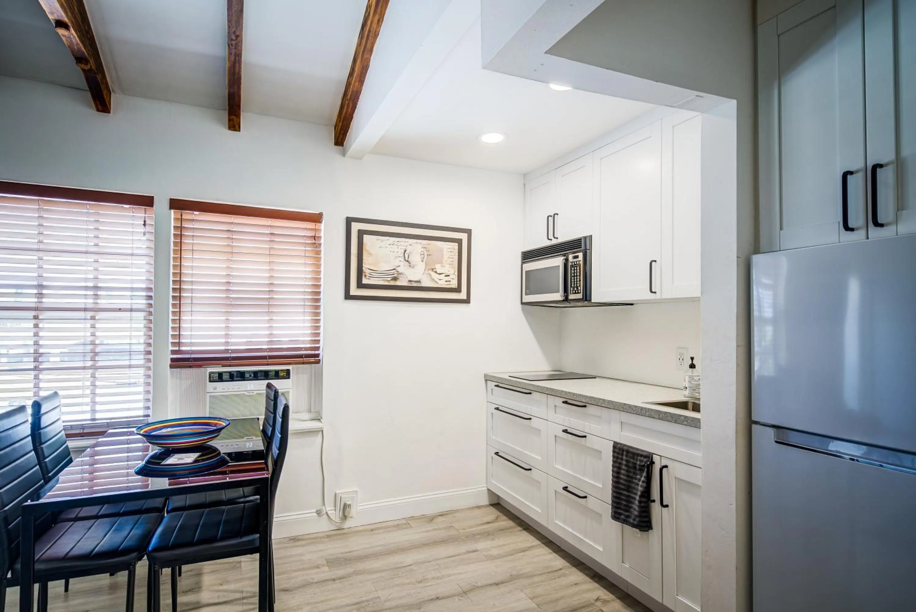 Kitchen or kitchenette in Little Paris by the ocean self check in