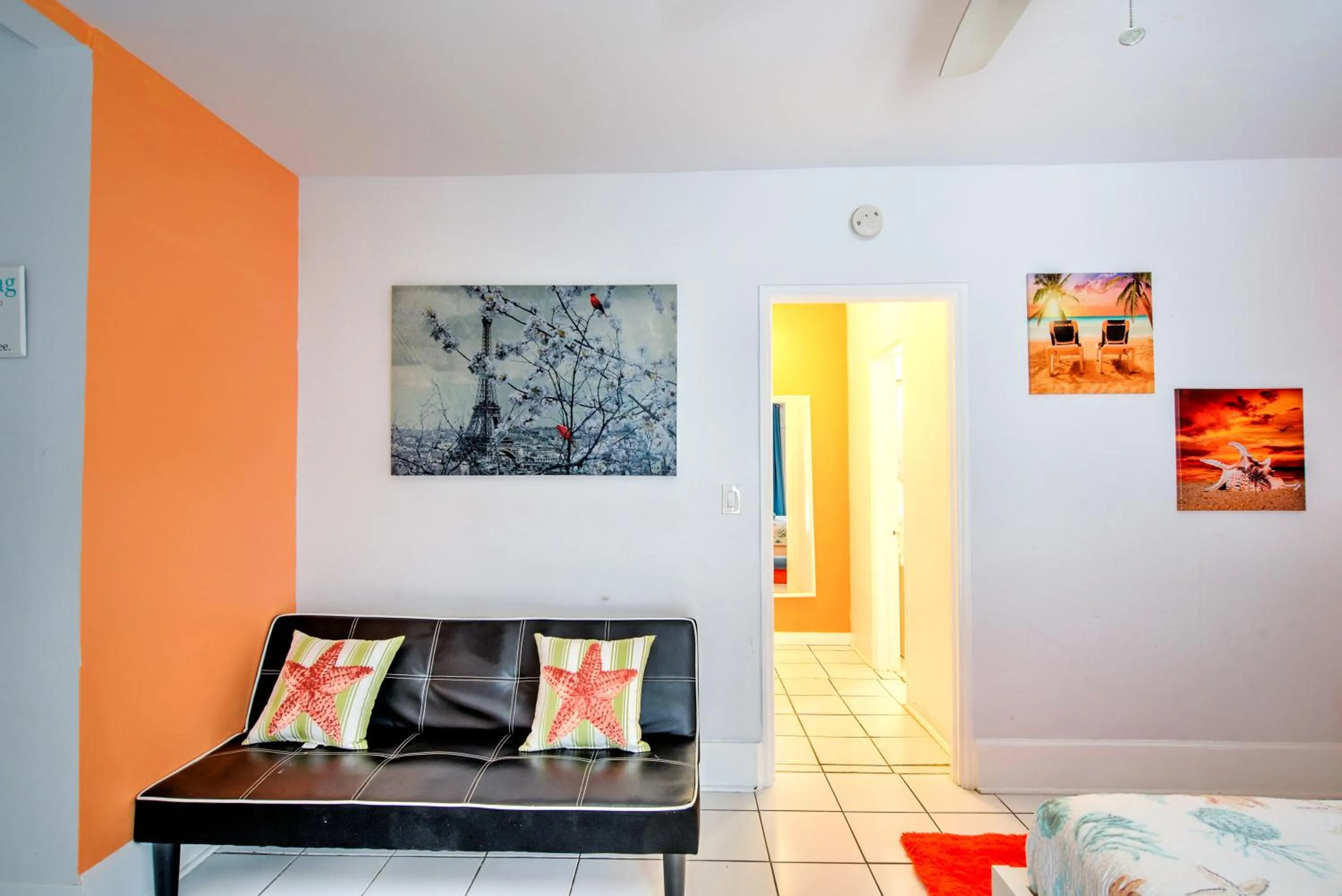 Seating area in Little Paris by the ocean self check in