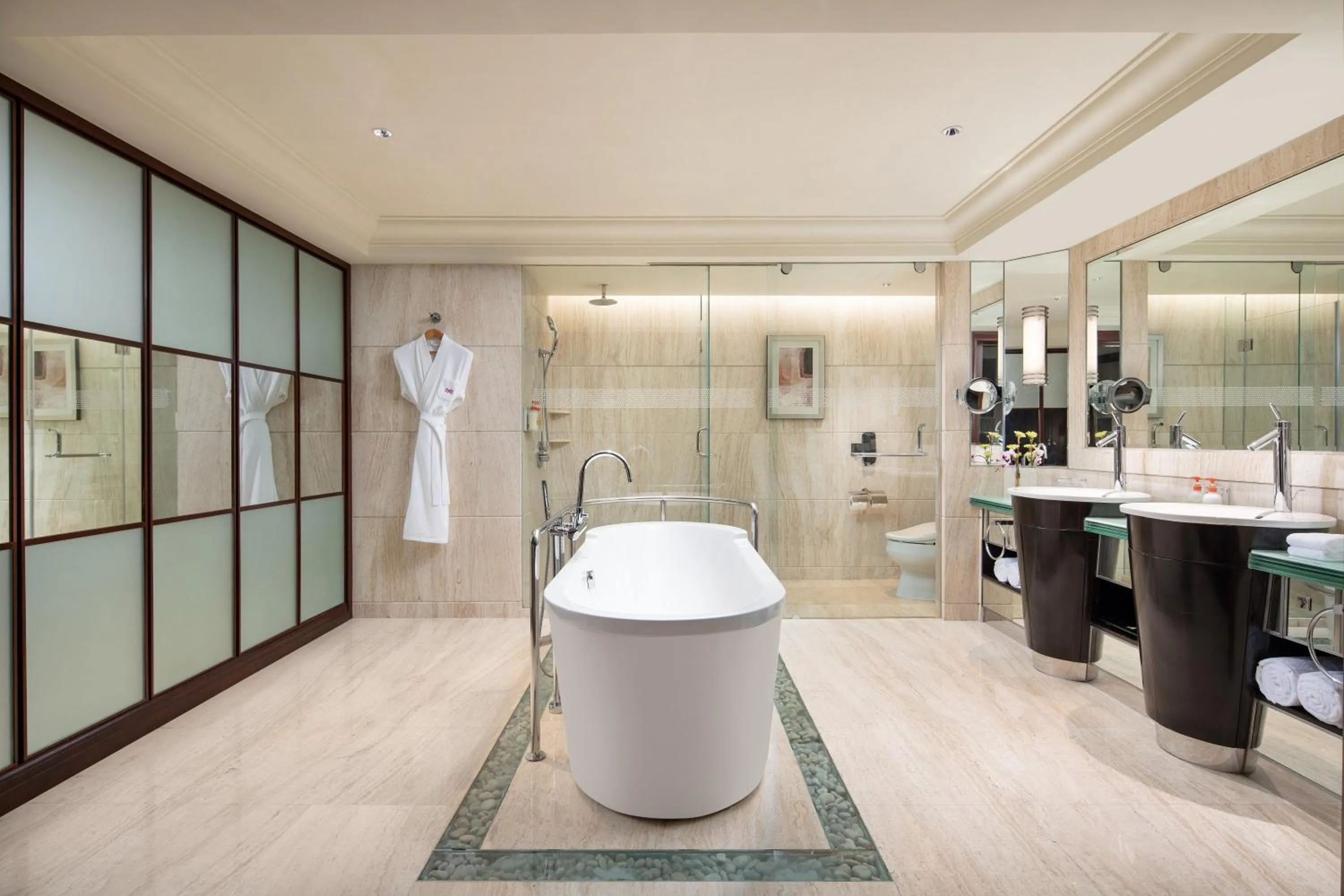 Bathroom in Crowne Plaza Shanghai Fudan by IHG