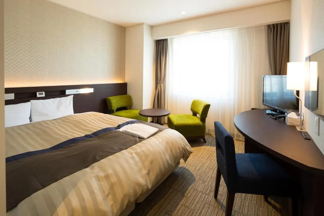 Photo of the whole room, Bed in Kochi Hotel