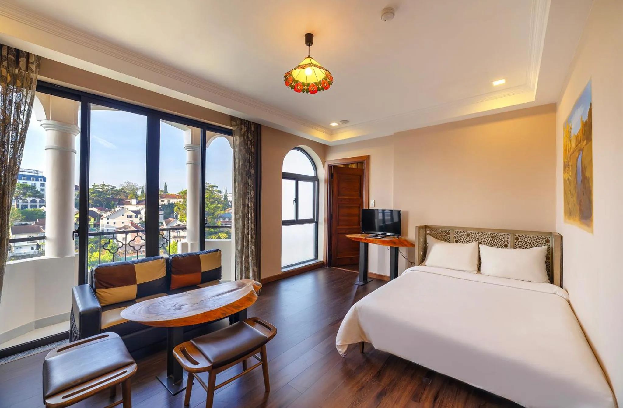 Communal lounge/ TV room, Bed in Guava Hill Boutique Hotel