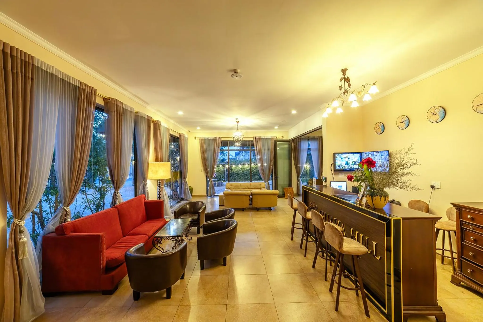 Communal lounge/ TV room in Guava Hill Boutique Hotel