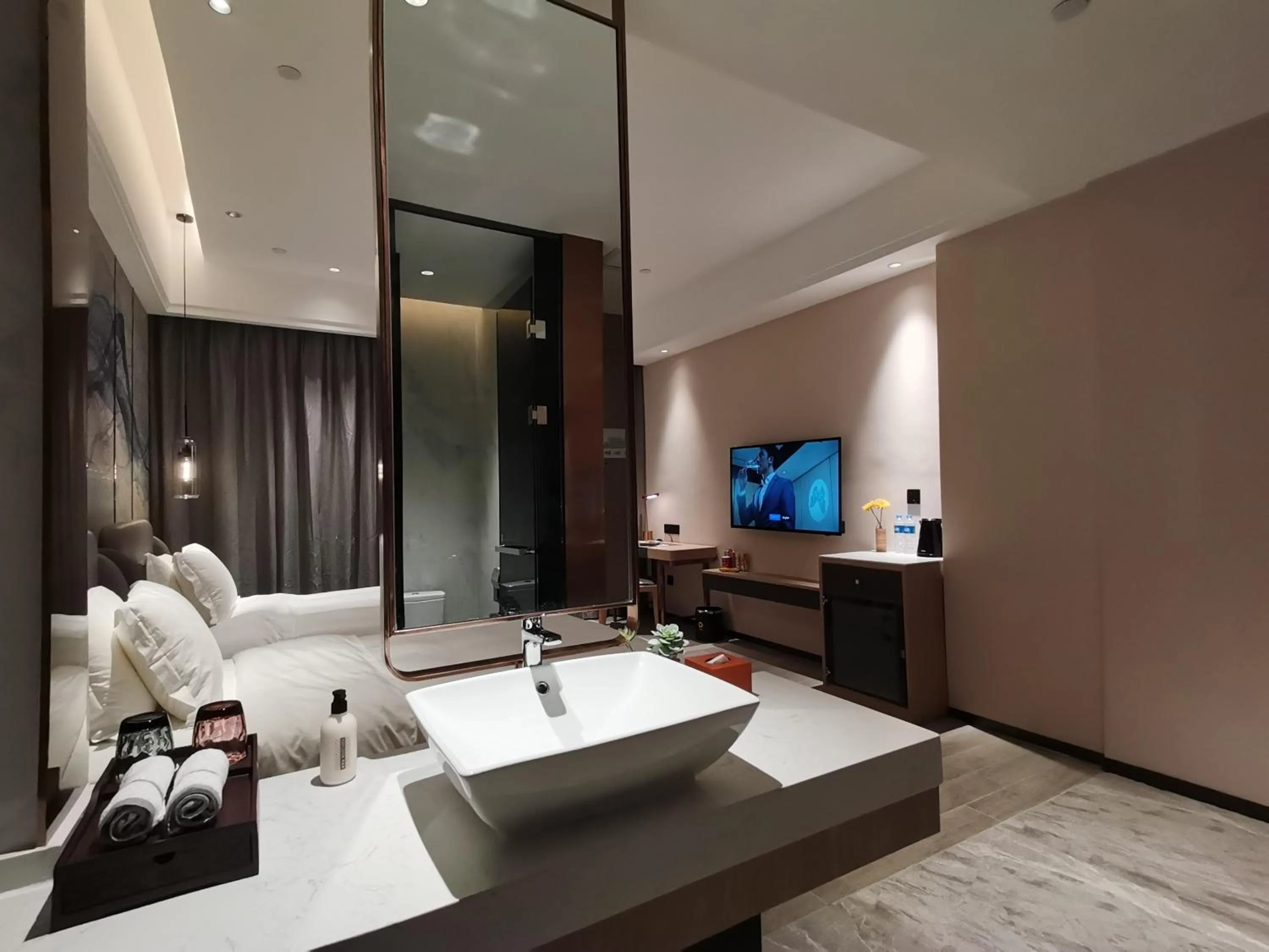 Bed in Paco Hotel Jinfeng Metro Guangzhou