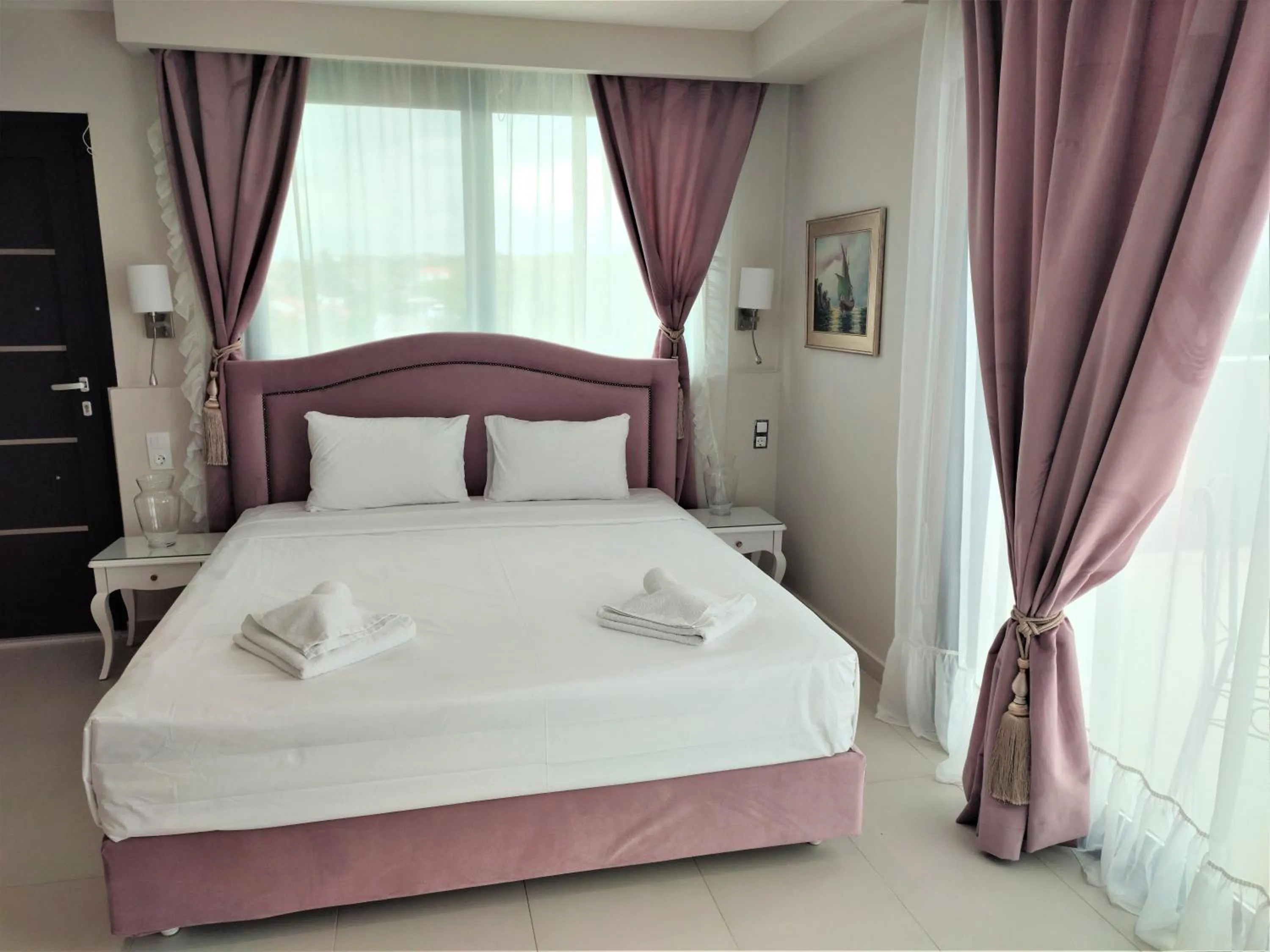 Bed in Light Blue Hotel