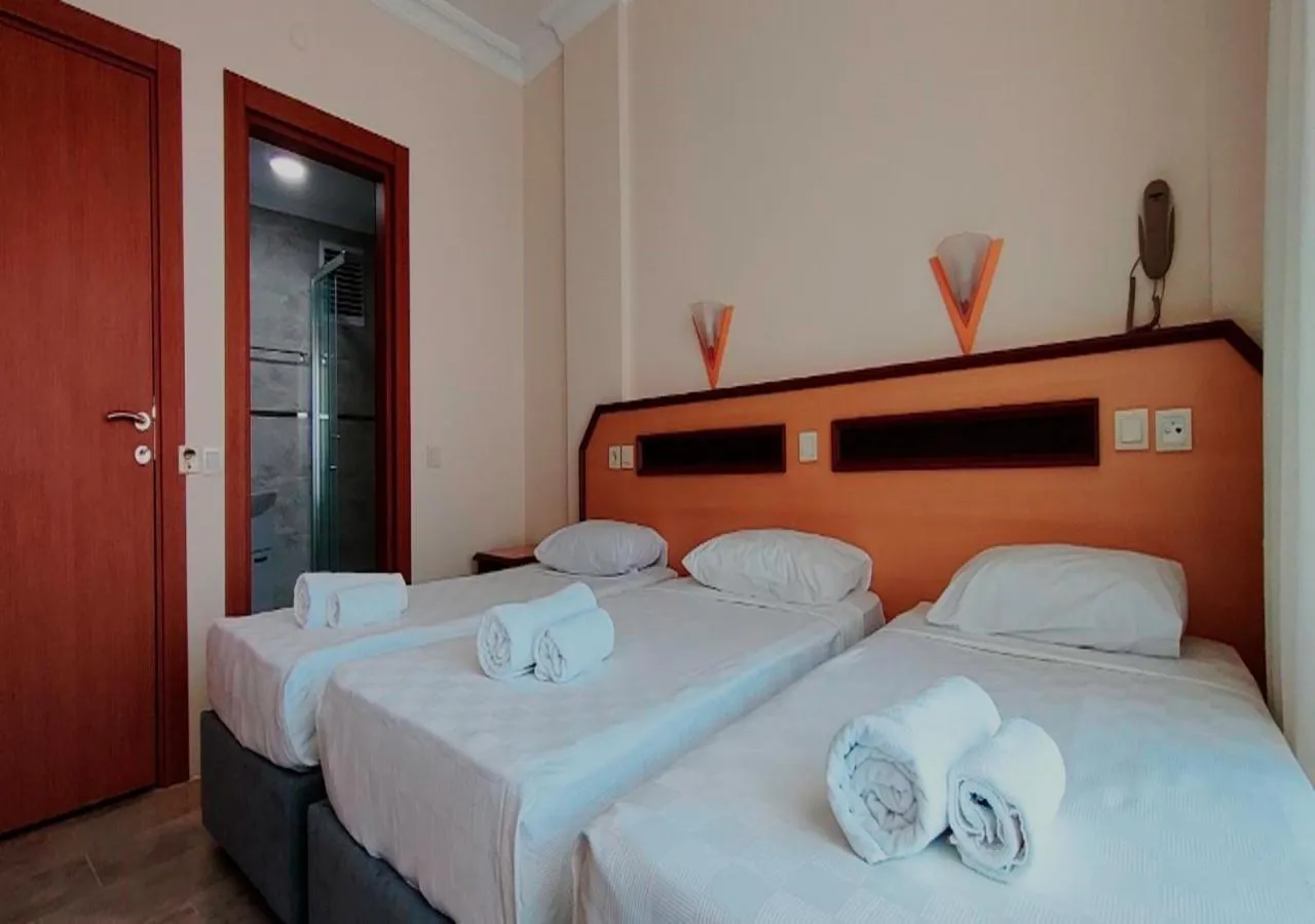 Bed in Side Özgürhan Hotel