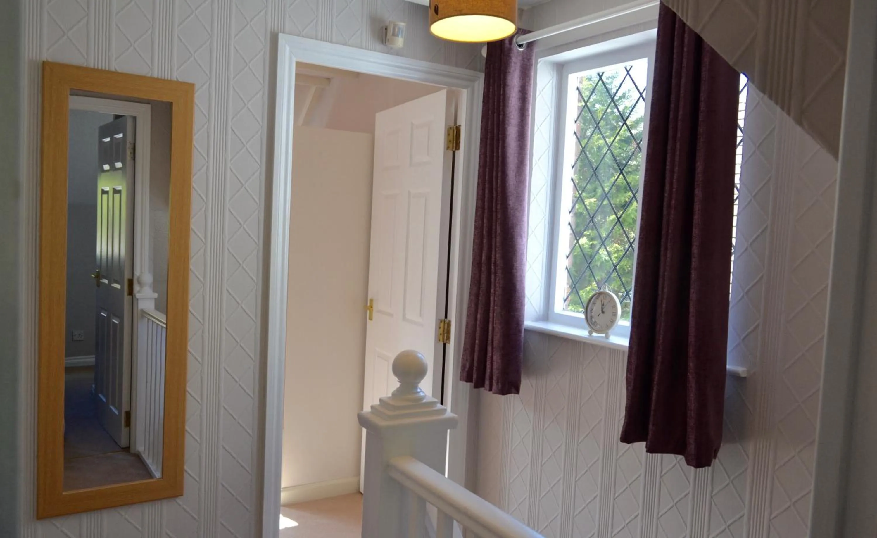 Bedroom in Riverbank Cottage