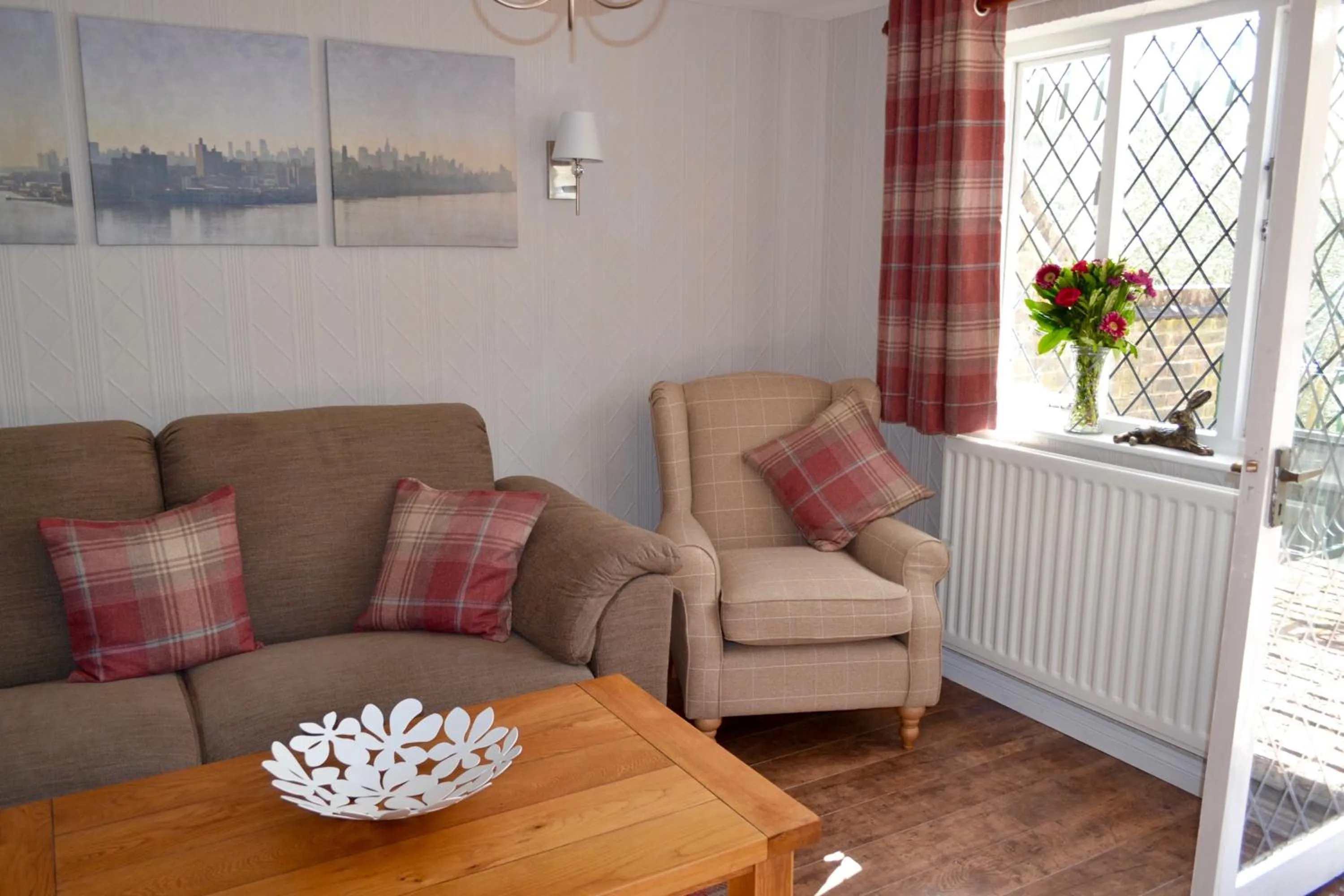 Living room in Riverbank Cottage