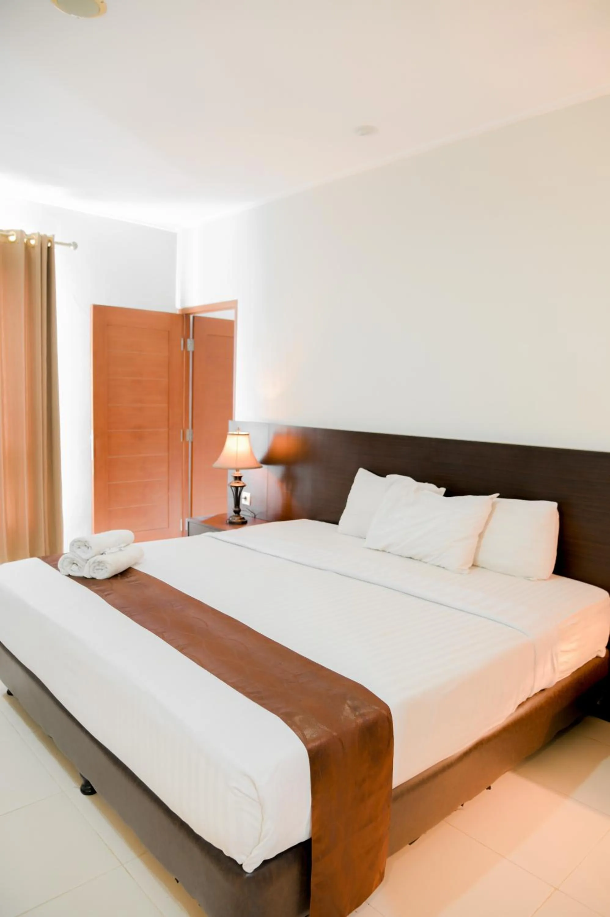Bed in Hotel Bonero Residence