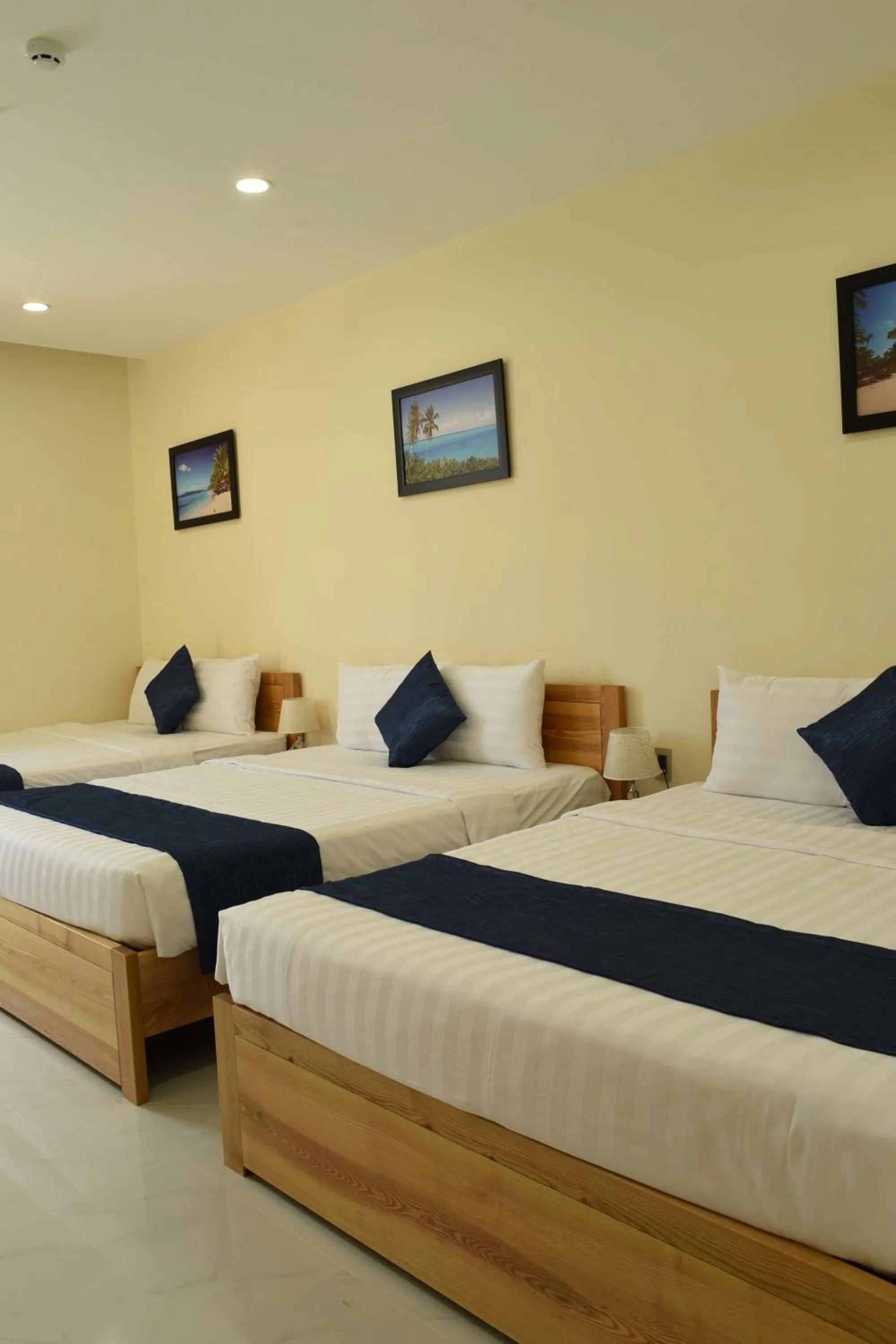 Bed in Lucky Star Ho Tram Hotel & Restaurant