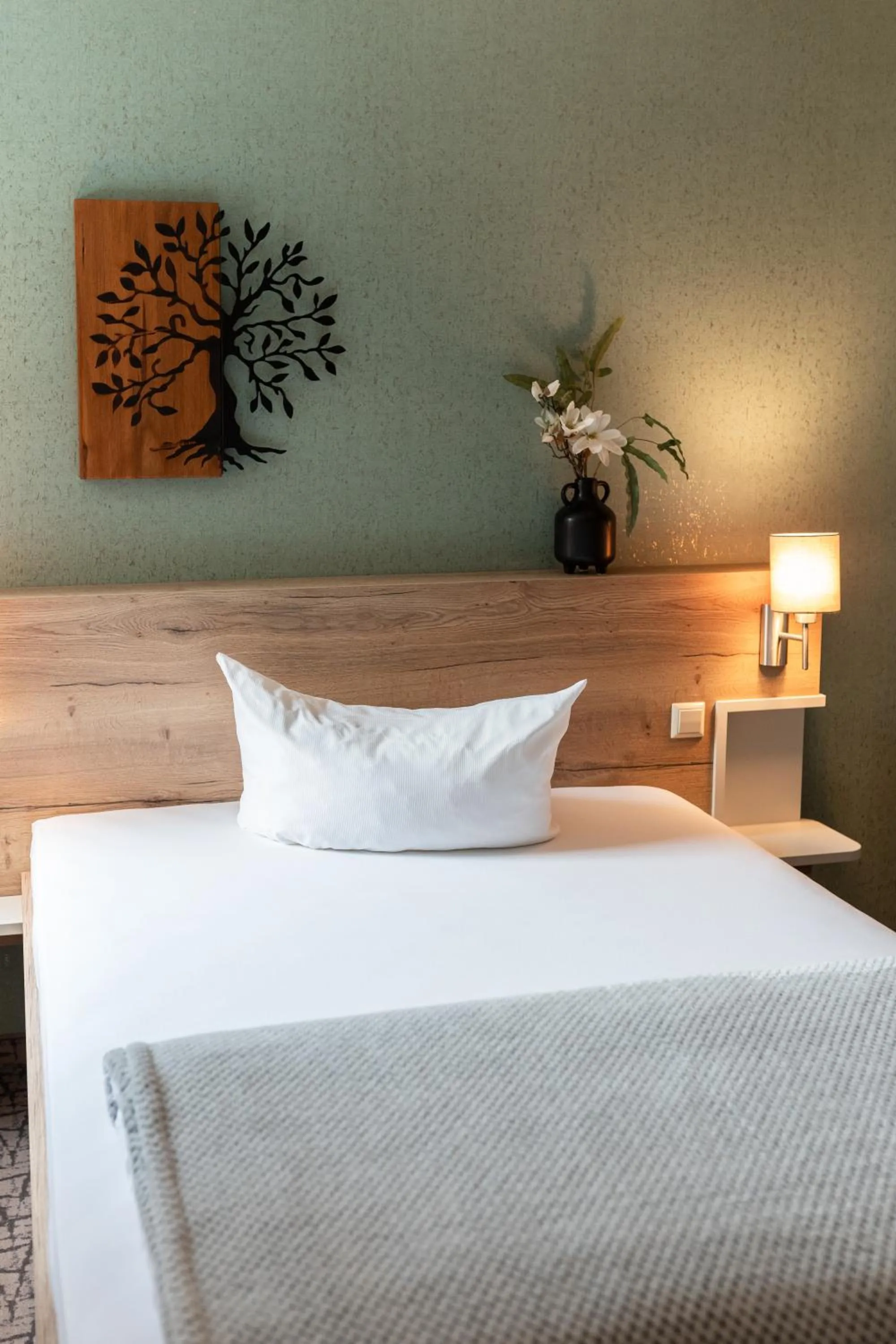 Bed in Hotel in der Mühle