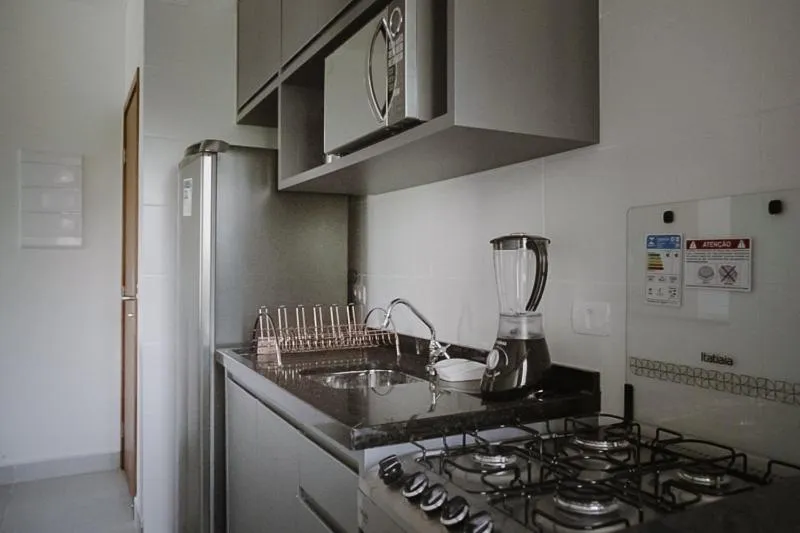 Kitchen or kitchenette in Jardim das Palmeiras II - Multipropriedade