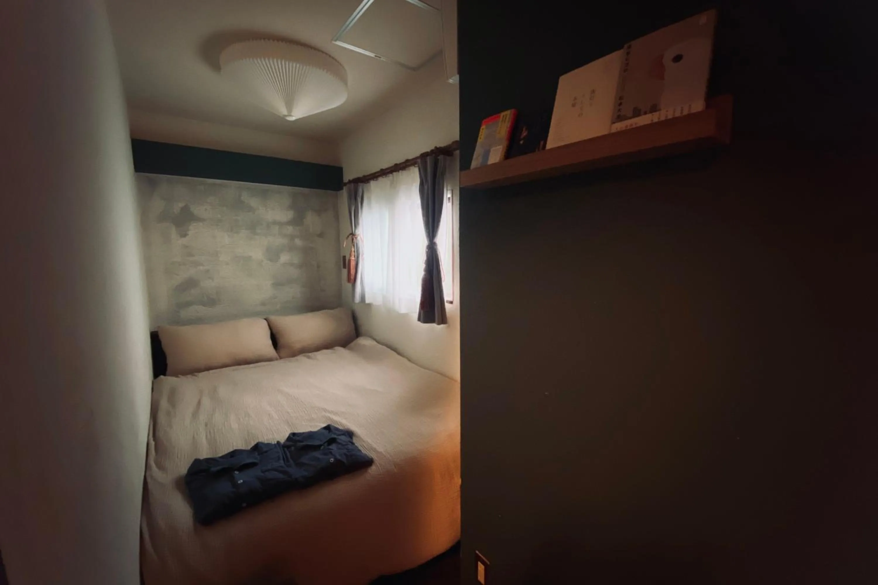 Bed in TOE LIBRARY Tokyo Asakusa