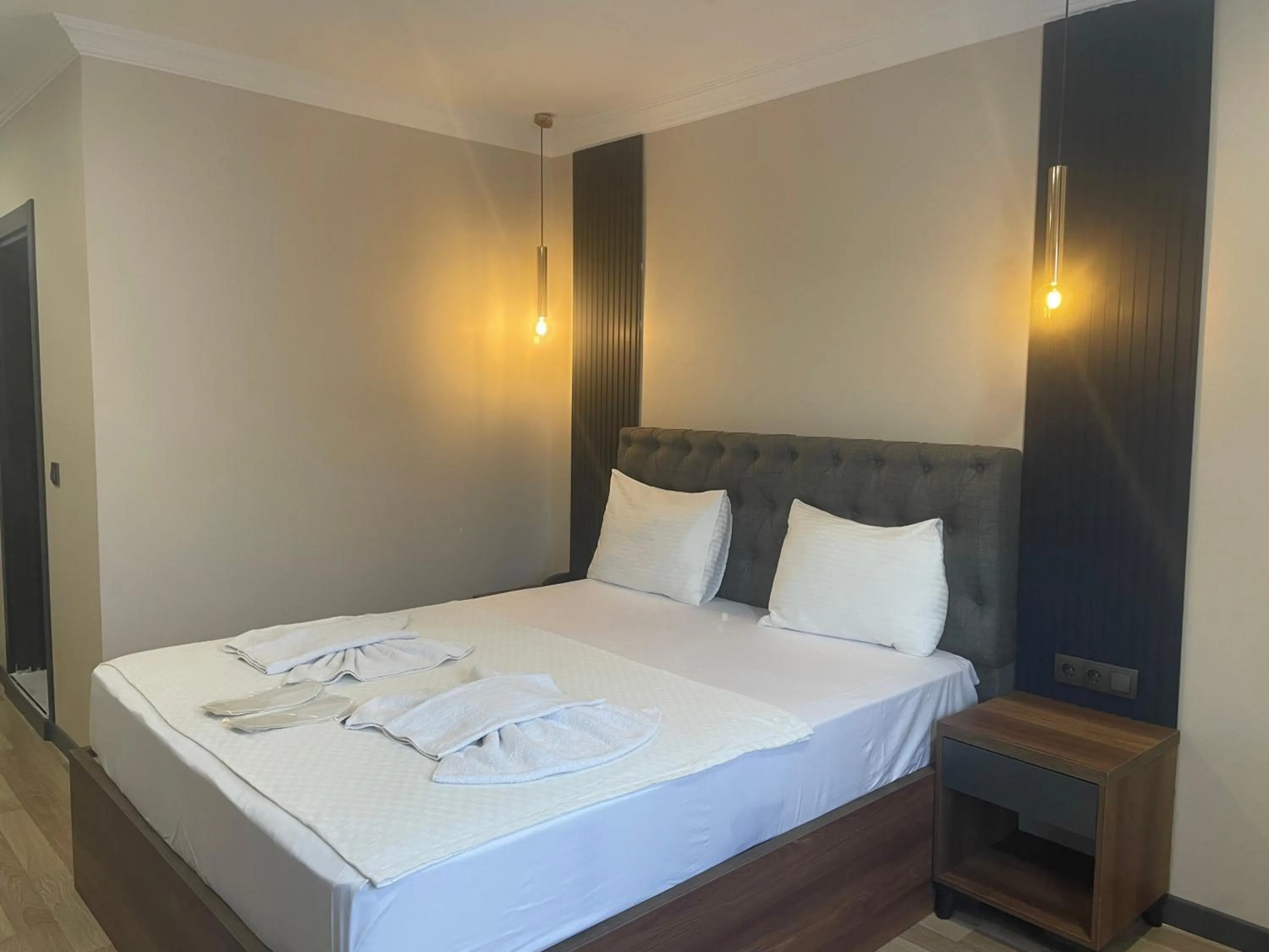 Bed in La Vie Suite Hotel