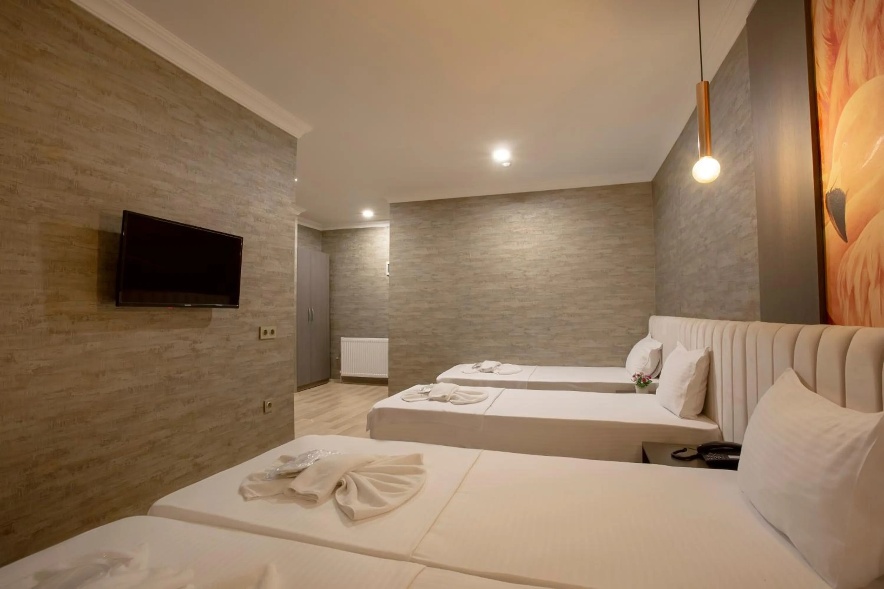 Bed in La Vie Suite Hotel